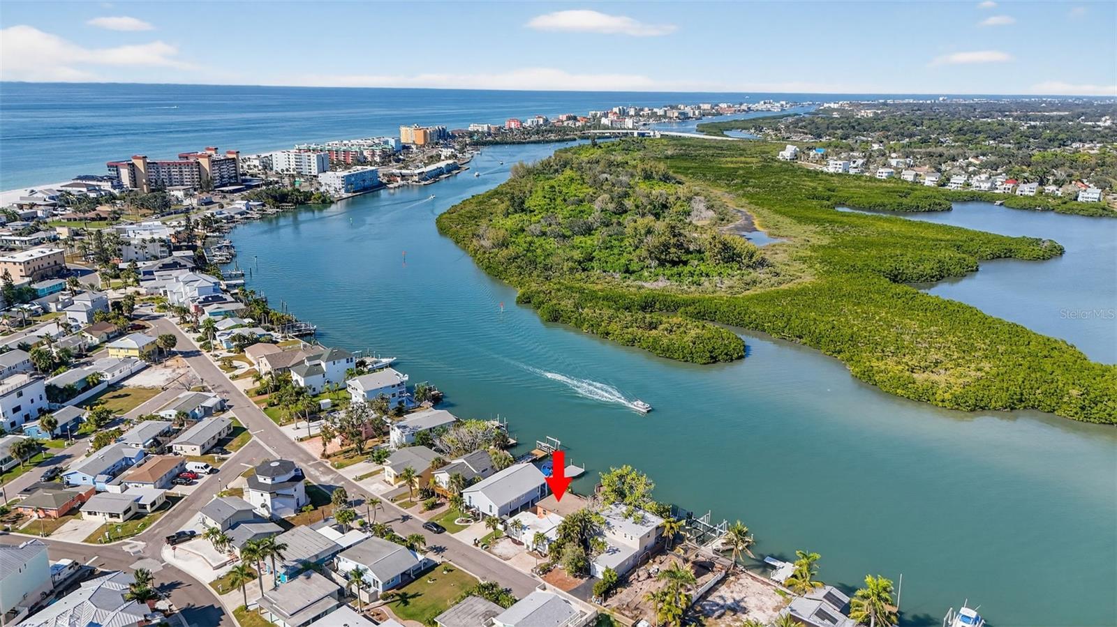 Exceptional opportunity to own this waterfront property in the highly sought-after Redington Shores community, featuring breathtaking views and a short walk to the Gulf Beaches. Perfectly situated along one of the most desirable stretches of the Intracoastal Waterway, this property enjoys a calm no-wake zone, offering an unbeatable blend of location, lifestyle, and value.
Enjoy unobstructed, wide-open water views from your private dock—with no homes across the channel—only the natural beauty of mangroves and coastal wildlife where dolphins and manatees are often spotted. Experience the essence of waterfront living—spend your days boating, fishing, or paddleboarding on the Intracoastal, or take a short stroll to your private beach access. Residents enjoy access to the exclusive Surfside Beach Club, offering private beach parking, picnic areas, outdoor showers, and a beautiful beachfront setting ideal for sunsets or relaxation. This sought-after coastal community provides the perfect balance of boating convenience and beachside leisure.
This waterfront home was taken down to the studs following flooding from Hurricane Helene, offering a solid foundation for renovation or rebuilding. The existing four-bedroom, two-bath framework, including space for two kitchens or an in-law suite, offers flexibility for a thoughtful redesign tailored to your needs. The home is configured with three structural openings for sliding glass doors along the waterfront side, enhancing the home’s indoor-outdoor living space. The existing dock provides direct access to the Intracoastal Waterway and presents an excellent opportunity for complete reconstruction, maximizing the property’s waterfront potential. Boaters enjoy direct Gulf access and a variety of waterfront dining options along the intracoastal, as well as a quick scenic ride to John’s Pass for additional restaurants, shopping, and entertainment.
Whether you choose to renovate, elevate, or rebuild, this property offers the perfect blank canvas to create your own luxury coastal retreat—combining prime location, waterfront lifestyle, and outstanding value. Property sold as is. Don’t miss the opportunity to make this exceptional waterfront location your own.