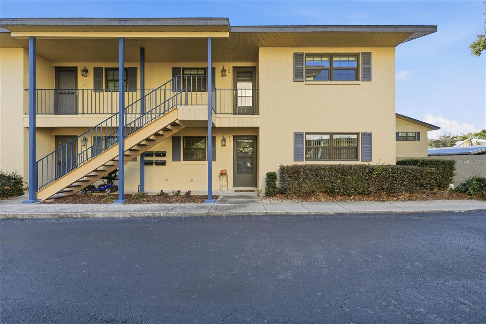 Welcome to this beautifully maintained 2-bedroom, 2-bath first-floor corner unit in the highly desirable Lakewood community of Mount Dora. This light-filled condo offers a spacious living and dining room combination, perfect for both relaxing and entertaining. Both bedrooms feature double closets, providing ample storage, while each bathroom includes additional built-in shelving for added convenience. The hall closet houses a stackable washer and dryer, maximizing functionality and space. Enjoy your morning coffee or unwind in the bonus sunroom, which overlooks the sparkling community pool area, a peaceful extension of your living space. This unit also includes an assigned one-car carport with guest parking conveniently located nearby. Residents of the Lakewood community enjoy access to a pool and clubhouse, all in a highly sought-after Mount Dora location close to shopping, dining, and  downtown charm. This is Florida condo living at its best!