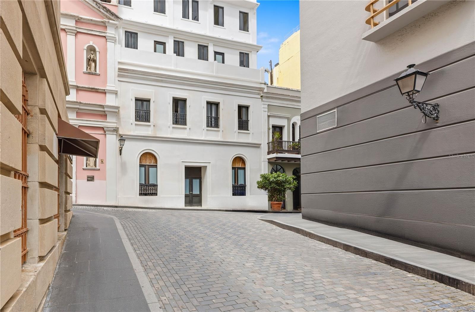 Located on the historic financial district of Old San Juan, 205 Calle Tetuan represents a rare and highly compelling investment opportunity in one of Puerto Rico’s most supply-constrained markets. This 8-unit multi-family property is comprised of two 2-bedroom units, four 1-bedroom units, and two studio apartments, offering a versatile unit mix ideally suited for short-term rentals, long-term leasing, or a hybrid strategy. The property enjoys charming city views throughout, with notable views of the San Juan Bay, particularly from the top floors and rooftop. A key highlight of this offering is its value-add and customization potential. The property can be finished and designed to a buyer’s specific vision, making it especially attractive for investors seeking to elevate the asset into a boutique short-term rental concept. The rooftop level offers additional upside, with the potential to be reimagined as a lounge or entertainment terrace and the possibility of creating additional units, subject to permits, maximizing both views and revenue potential. Surrounded by Old San Juan’s iconic architecture, waterfront promenades, dining, galleries, and cultural landmarks, 205 Calle Tetuan stands at the intersection of history, lifestyle, and income potential, an exceptional opportunity to create a high-performing asset in one of the Caribbean’s most enduring destinations.