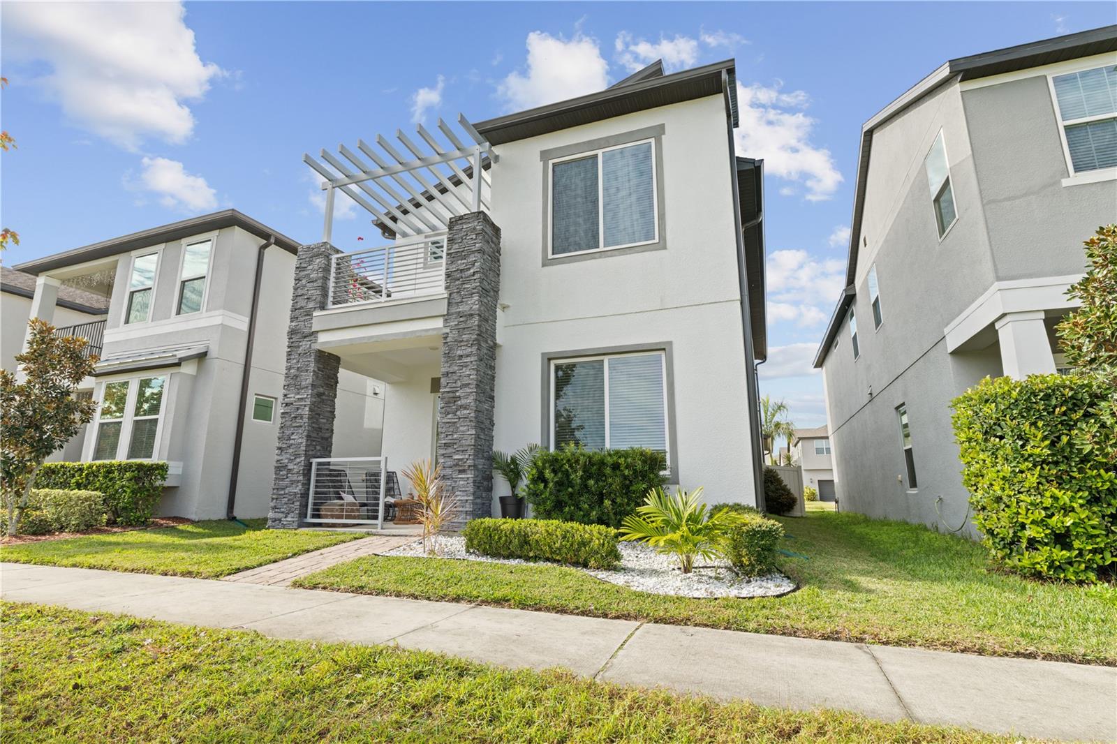 Welcome to the highly desirable Oakland Trails community, where this beautifully designed 2019 Meritage Home offers an exceptional blend of modern comfort, energy efficiency, and everyday convenience. Ideally located just approximately 30 minutes from Disney, Universal, and Downtown Orlando, the home provides easy access to major attractions while preserving a peaceful residential atmosphere.
Oakland Trails is known for its top-rated schools, scenic walking and biking trails, and thoughtfully planned amenities, including a community pool, clubhouse, and dog park. The neighborhood features wide streets, attractive entryways, and a welcoming environment, with close proximity to Historic Downtown Winter Garden, offering popular restaurants, breweries, shops, and community events.
Built with energy efficiency in mind, this Meritage Home includes spray foam insulation, helping maintain consistent indoor comfort while reducing utility costs. The home is equipped with an advanced HVAC system featuring enhanced air purification and fresh-air intake, ideal for comfortable and healthy living.
The interior showcases a gourmet kitchen with KitchenAid appliances, quartz countertops, and a custom-tiled island, complemented by high ceilings and tall doorways that create an open, airy feel throughout. Additional features include a partially metal and shingle roof, a full gutter system, a custom wood staircase, and a spacious primary suite with a built-in closet system. Generous storage throughout the home makes it well suited for families of any size.
The property is ideal for long-term rental use. While short-term rentals are restricted by the HOA, the home’s modern construction, low-maintenance design, and strong location support long-term value and rental stability.
Notably, the home has been strictly pet-free under current ownership, making it an excellent option for buyers with sensitivities. A detailed list of builder upgrades and owner improvements will be provided with the listing, offering full transparency into the home’s added value.
Additional features include installed security cameras and a custom Tesla charging outlet, included at no additional cost with a full-price offer. Furniture is not included; however, the seller is open to selling select items separately if desired.
A well-maintained, energy-efficient home in one of the area’s most sought-after communities — offering quality construction, lifestyle amenities, and long-term appeal.