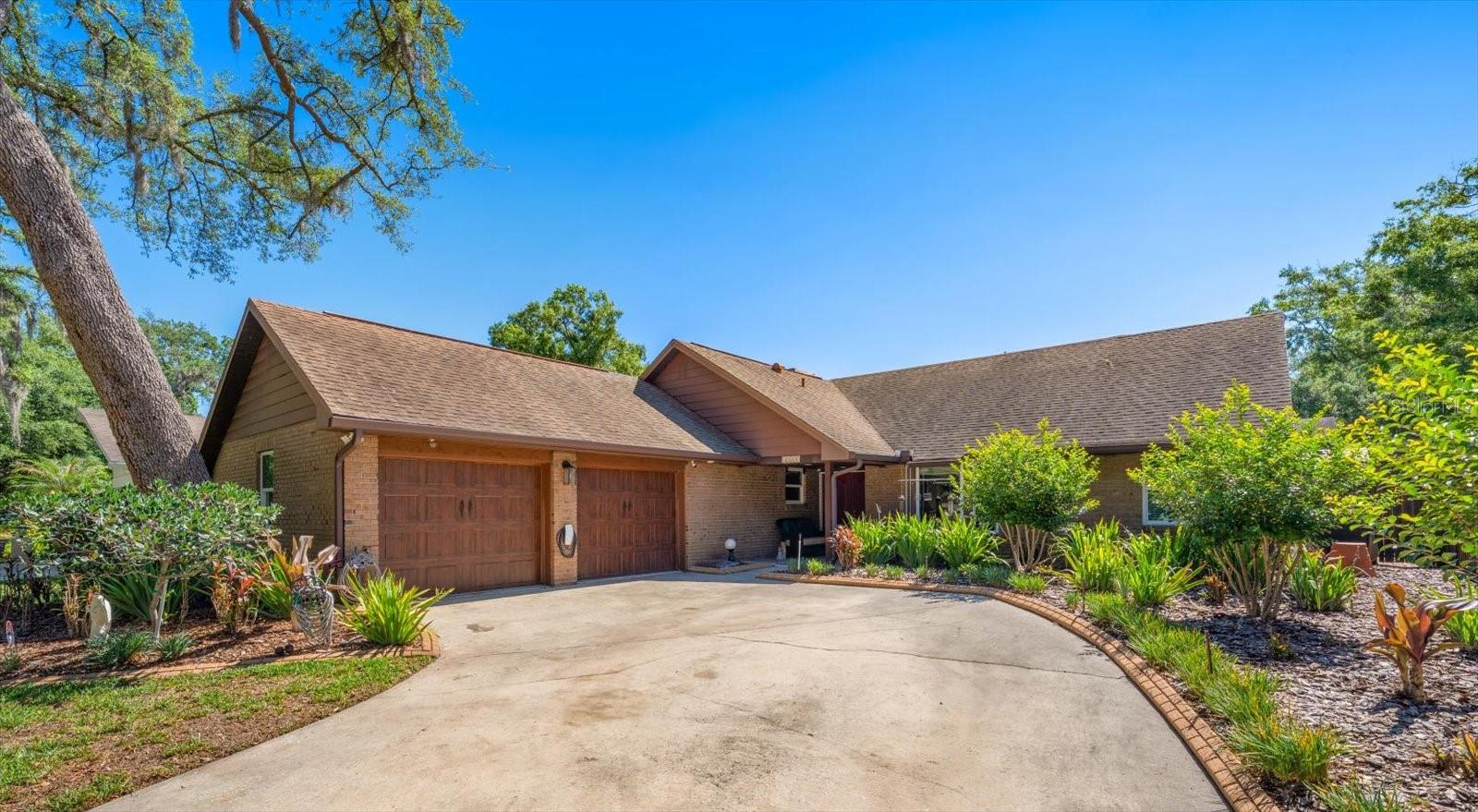 Backyard oasis meets everyday family life in this inviting two-story home offering 2,005 heated sq ft (2,945 total), 4 bedrooms and 2.5 baths, anchored by a cozy fireplace. The flexible layout features two bedrooms on the main level—including the primary suite—and two more upstairs for privacy and play.

The star is the rear retreat: a screened pool with spa, expansive wood deck for grilling and gatherings, and a covered lanai with motorized shades that turns afternoon sun into all-day comfort. A handy shed keeps gear tucked away, and the 10,010 sq ft, no-HOA lot means room to spread out.

Inside, the kitchen flows to dining and living spaces with clear sightlines to the pool, while a climate-controlled converted garage adds a versatile office, playroom, or studio. 

Set in Temple Terrace, you’re moments from neighborhood favorites—Temple Terrace Golf & Country Club, Riverhills Park and boat ramp on the Hillsborough River, and the boardwalks and trails of Lettuce Lake Park. Daily errands are easy with nearby groceries, dining, and services, plus quick access to USF, the Moffitt medical corridor, and attractions like Busch Gardens. Comfortable, versatile, and ready for all-season Florida living.