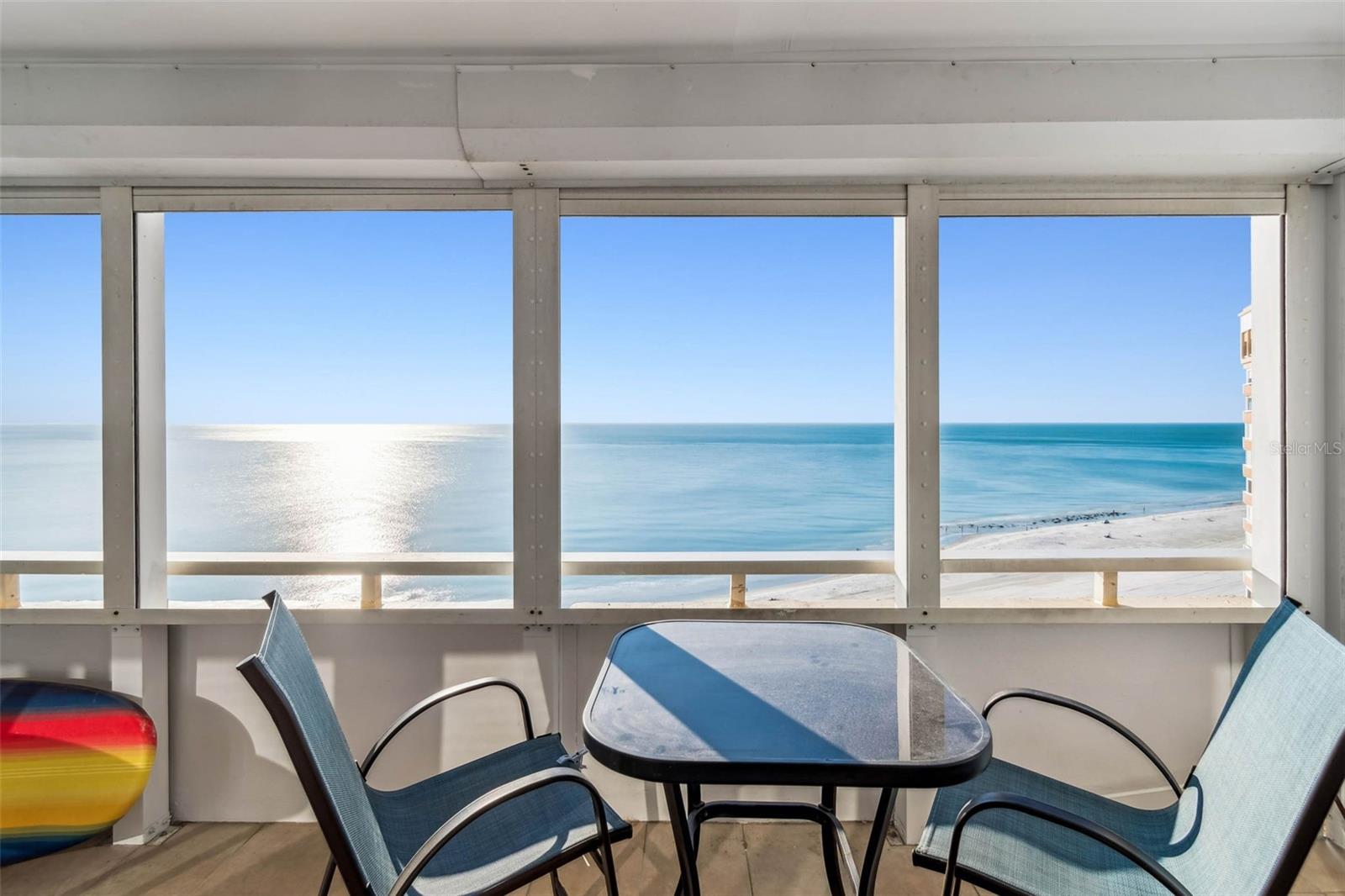Come live the ultimate beach life in this stunning 15th-floor condo overlooking the Gulf of Mexico in beautiful Redington Shores! Enjoy breathtaking, unobstructed water views and spectacular, year-round sunsets right from your private 25-foot Gulf-front balcony - or head down to the beach to feel the sugar-white sand between your toes. This light, bright, and airy 1-bedroom, 1.5-bath unit offers just under 1,000 square feet of beautifully designed living space. Gorgeous Gulf-front views flow seamlessly through the living room, kitchen, dining area, and directly into the spacious, 220+ square foot bedroom, which offers ample room for a sitting area or home office. The updated kitchen features elegant marble countertops, soft-close shaker cabinetry, and a striking blue-green backsplash that perfectly echoes the ocean beyond your windows. Additional interior features include a walk-in closet, a dedicated makeup vanity, a private bath, and low-maintenance tile flooring throughout—completely carpet-free! This unit includes one covered parking space, with a second space conveniently available for purchase. Residents enjoy an array of incredible resort-style amenities, including a Gulf-front pool, direct beach access, outdoor grilling areas, a dedicated storage area, and a brand-new community exercise room, library, and billiard/ping pong room. As an added bonus, condo dues decreased for 2026 to $797/month (down from $881) and conveniently cover water, sewer, trash, cable, and high-speed internet. Whether you’re seeking a dreamy vacation getaway or a full-time coastal retreat, this condo checks every single box. Be sure to explore the 3D Virtual Tour, then schedule your private showing to experience beachfront living at its finest!