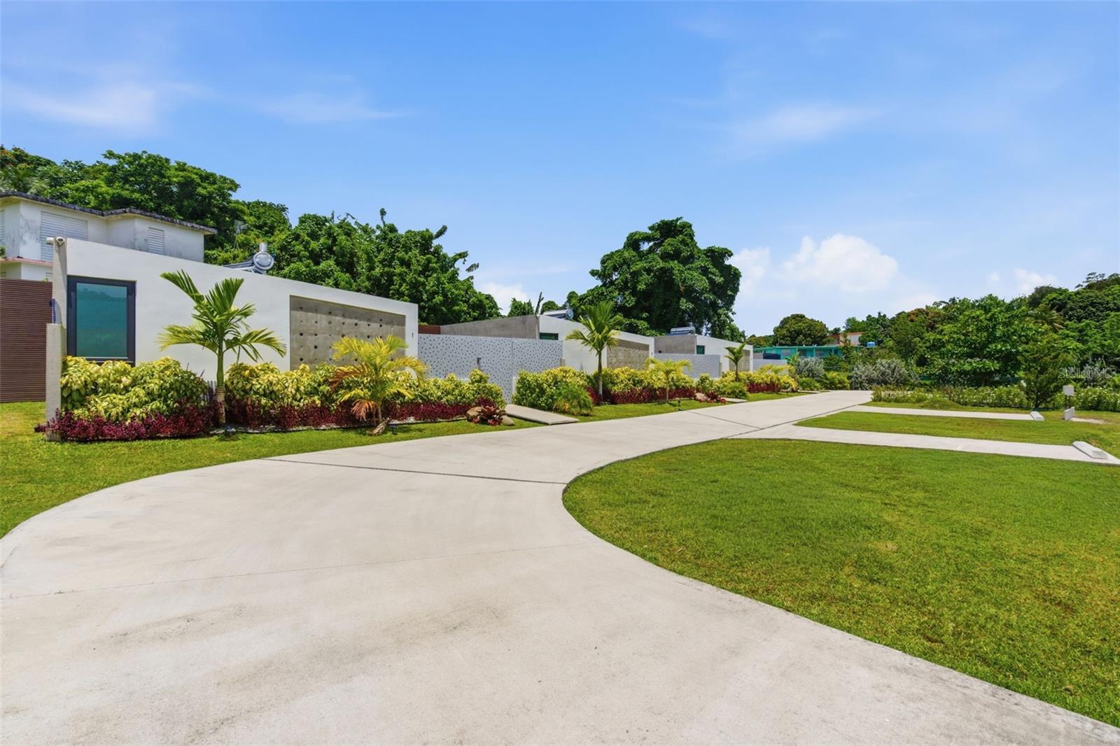 St. Antonella Village is an exclusive eco-luxury retreat in Río Grande consisting of three independent modern villas designed for luxury hospitality and short-term rental income potential. 

Thoughtfully developed for discerning guests seeking privacy, comfort, and resort-style amenities, the property presents an exceptional turnkey Airbnb or vacation rental investment opportunity in one of Puerto Rico’s fastest-growing tourism markets.

Each private villa features 1 bedroom, 1 full bathroom, a fully equipped kitchen with wine cooler, open-concept living area with sofa bed, and sophisticated contemporary finishes throughout. Every unit includes its own private pool, terrace with outdoor lounge furniture and sunbeds, assigned parking, and independent access, allowing guests to enjoy complete privacy while traveling together.

The development incorporates an eco-luxury infrastructure concept with solar water heaters, a solar energy system with Tesla batteries, a 20kW Caterpillar generator, and water cistern, ensuring operational efficiency, sustainability, and uninterrupted guest comfort.

The beautifully landscaped grounds include shared amenities such as a gazebo, firepit area, half basketball court, children’s area, gardens, and architectural lighting that enhance the overall guest experience both day and night. Controlled-access entry and security cameras provide additional privacy and peace of mind.

Ideally located minutes from El Yunque National Forest, Luquillo Beach and kiosks, Fajardo’s marinas, the bioluminescent bay, and popular excursions to Icacos Island. Conveniently situated approximately 25 minutes from Luis Muñoz Marín International Airport and 45 minutes from Old San Juan, the property is perfectly positioned to capitalize on strong tourism demand and short-term rental performance.

A unique opportunity to acquire a fully designed multi-unit luxury retreat with excellent income-producing potential in Puerto Rico’s thriving vacation rental market.