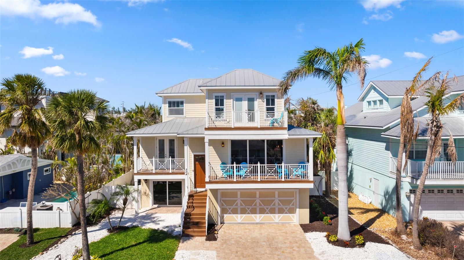 Paradise is Here! 6-Bedroom, 5-Bathroom Furnished, Turnkey Island Retreat in Holmes Beach Welcome to your dream beachside escape: This stunning 3-level single-family home is located just one block from the powdery sand beaches of the Gulf coast in highly sought-after Holmes Beach on Anna Maria Island. Weather you're Looking for a lucrative investment property or a private island oasis, this fully furnished, turnkey residence offers the best of both worlds. With 6 bedrooms and 5 bathrooms in total, there's plenty of room for everyone to spread out and enjoy the ultimate island lifestyle. This property boasts prime walkable access to the beach while maintaining a sense of privacy and tranquility. Highlighting each floor, the First Floor has a 2-car garage and a versatile bonus/game room with direct access to the pool and patio. The Second Floor features a Bright and airy open-concept kitchen, living and dining spaces, complete with a cozy dinette for casual meals. Three spacious bedrooms, two full bathrooms, and a convenient laundry room complete this level. The Third Floor provides a luxurious primary suite with a spa-like ensuite bathroom, two additional oversized bedrooms, and another 2 full bathrooms. The beautifully landscaped, fenced backyard is a true tropical paradise featuring a private pool and spa, along with outdoor dining and lounging areas perfect for relaxing or entertaining. Investors will appreciate the solid rental income potential while private buyers can immediately move in and embrace the laid-back Florida lifestyle. Don't miss this rare opportunity to own a slice of paradise on Anna Maria Island!