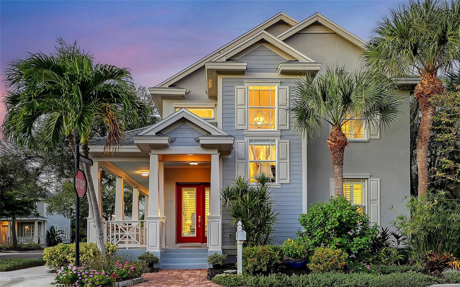 Between North Siesta Key and Oyster Bay, this coastal craftsman contemporary residence offers the leisure of a maintenance-free lifestyle in a desirable location. Visit nearby shopping and dining, or just a quick drive to Siesta Key Beach or downtown Sarasota. Positioned across from the community pool, the home offers easy-care landscaping complemented by a charming herb garden. Built of solid concrete block construction for lasting durability, recent improvements include new UV purification in air-conditioning units, a new roof and fresh exterior paint. The well-designed floor plan offers four bedrooms and three baths, with a flowing open layout that connects the great room, dining area and kitchen beneath high ceilings filled with natural light. A private guest suite above the garage provides flexible space for multi-generational living, a studio or fitness retreat. Throughout the home, refined details like solid-wood cabinetry, deep-trimmed windows and fine millwork reflect craftsmanship and quality. The great room impresses with a two-story ceiling and fireplace, while the kitchen showcases shaker cabinetry, quartz countertops, a center island, stainless-steel appliances and a walk-in pantry. Living in Granada Park provides the ease of a lock-and-go lifestyle in a gated, established neighborhood. This pleasant haven is conveniently just .3 miles from Publix, .5 miles to CineBistro, 1.3 miles to Southside Village, two miles to Sarasota Memorial Hospital, 2.6 miles to downtown Sarasota and five miles to Siesta Key Beach. It’s the best of Sarasota living, wrapped in a maintenance-free, West of Trail lifestyle.