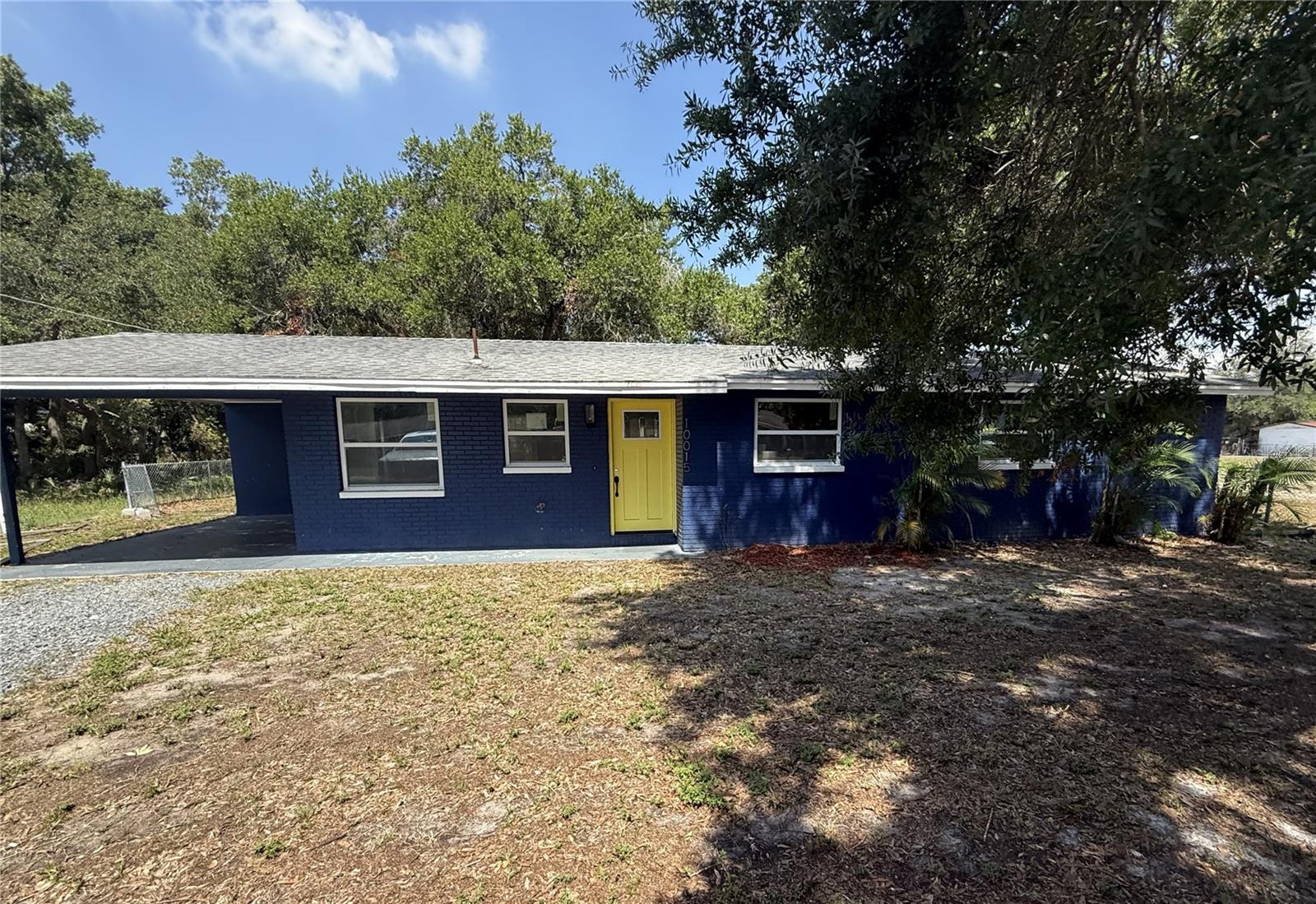 Great opportunity in Gibsonton with no HOA or CDD! Built in 1971, this home offers 3 bedrooms, 2 bathrooms, carport, 1069 square feet, 1/3 acre fenced property with open shed/carport in backyard. Step inside to an open concept kitchen/living/dining space - the perfect setup for entertaining. The kitchen features updated modern white cabinetry, quartz counters and island with range. The living and dining room are conveniently located off the kitchen with views of the oversized backyard through sliding doors. The hall off the kitchen leads to the primary suite with full bathroom - vanity, step in shower and walk in closet. The other two secondary bedrooms are just beyond and share a full bathroom. Great central location with easy access to I-75, shopping, dining, and everyday essentials. It's good to be home. This property may qualify for Seller Financing (Vendee).
