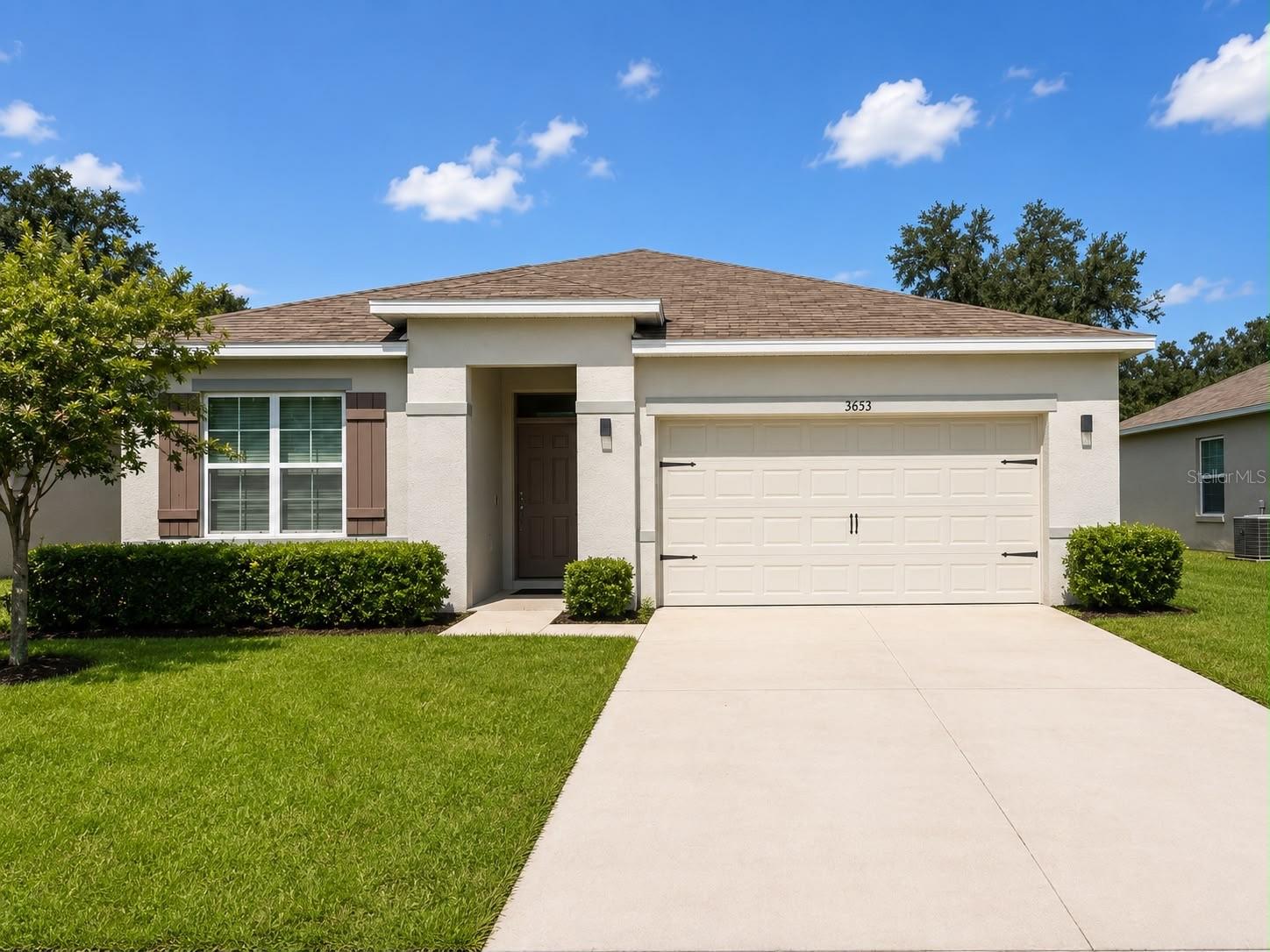 This 3-bedroom, 2-bathroom home perfectly blends value and a prime location. Its open-concept layout features a kitchen facing the dining and living spaces, creating an ideal setup for family get-togethers. Notable details include 18x18 ceramic tiling in wet zones and stainless-steel kitchen appliances. The neighborhood offers large homesites, open green spaces, and conservation views. Commuting is easy with fast access to the Florida Turnpike, the airport, and Lake Nona/Medical City. You can host guests at home or visit Lakeshore Park to enjoy its marina, picnic areas, splash pad, and beachfront playground. Do not pass up this chance to buy an affordable property. This one is priced to be sold fast! * Information recorded in the MLS is intended to be accurate, but NOT GUARANTEED. HOA fees and regulations, home square footage, room sizes, and lot size should be independently verified.