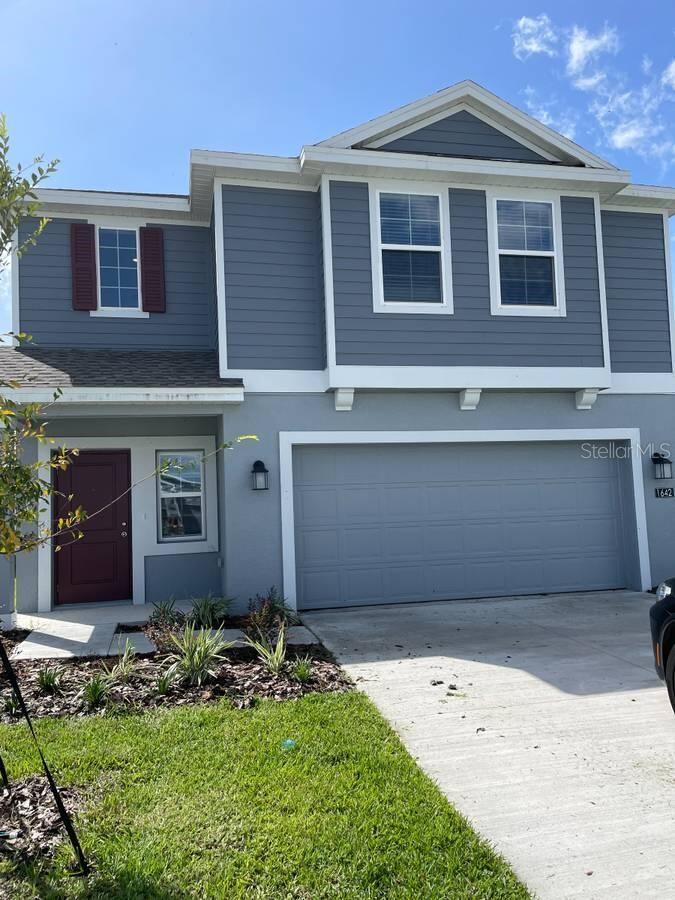 Welcome to 1642 Teagan Lane, a charming 2 Story house located in Winterhaven, FL 33884. This newly constructed property presents a wonderful opportunity to enjoy comfortable living in a well-situated location. The house boasts a classic design with a welcoming exterior and a spacious layout that caters to a variety of needs. As you approach, you'll notice the well-maintained facade that adds to its curb appeal. Inside, the house provides ample space for living, dining, and entertaining. The property's layout is designed to maximize functionality while providing a cozy and inviting atmosphere. Large windows allow natural light to fill the rooms, creating a bright and airy ambiance throughout. Whether you're looking to relax or host guests, this house provides a versatile setting for any occasion. The outdoor area provides additional space for leisure and recreation, making it a superb complement to the indoor living areas. With its convenient location and appealing features, 1642 Teagan Lane is a wonderful place to call home.