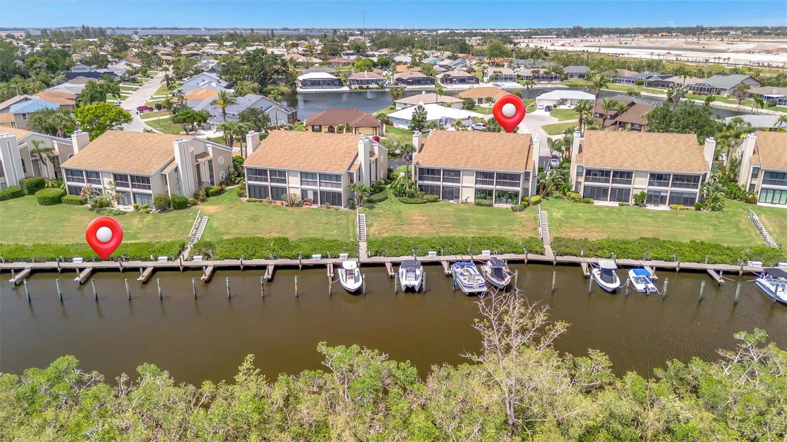 BOATER'S PARADISE!! Welcome to Bay Hollow – a rare opportunity to own a beautifully maintained second-floor condo offering stunning water views, a private boat dock, and community pool.

This spacious 2-bedroom, 2-bath residence spans 1,561 sq ft of thoughtfully designed living space. Step inside to find an inviting open-concept layout with an abundance of natural light, highlighted by a cozy living room fireplace – perfect for relaxing evenings with family or guests.

Enjoy serene waterfront views from your private balcony, ideal for morning coffee or sunset cocktails. Boating enthusiasts will love the convenience of a deeded private dock, providing direct access to the Intracoastal Waterway and beyond.

The primary suite features a walk-in closet and en-suite bath, while the guest bedroom and second full bath offer comfort and privacy for visitors. The condo also includes in-unit laundry, ample storage, and covered parking.

As part of a well-maintained community, you’ll have access to a sparkling pool, lush landscaping, and a peaceful, laid-back coastal lifestyle – all just minutes from the beaches of Anna Maria Island, historic Cortez fishing village, world-renowned IMG Academy, shopping, dining, and local golf courses.

Whether you’re looking for a full-time residence, seasonal escape, or investment property, this waterfront gem checks every box.

Don’t miss your chance to own a slice of paradise – schedule your private showing today!