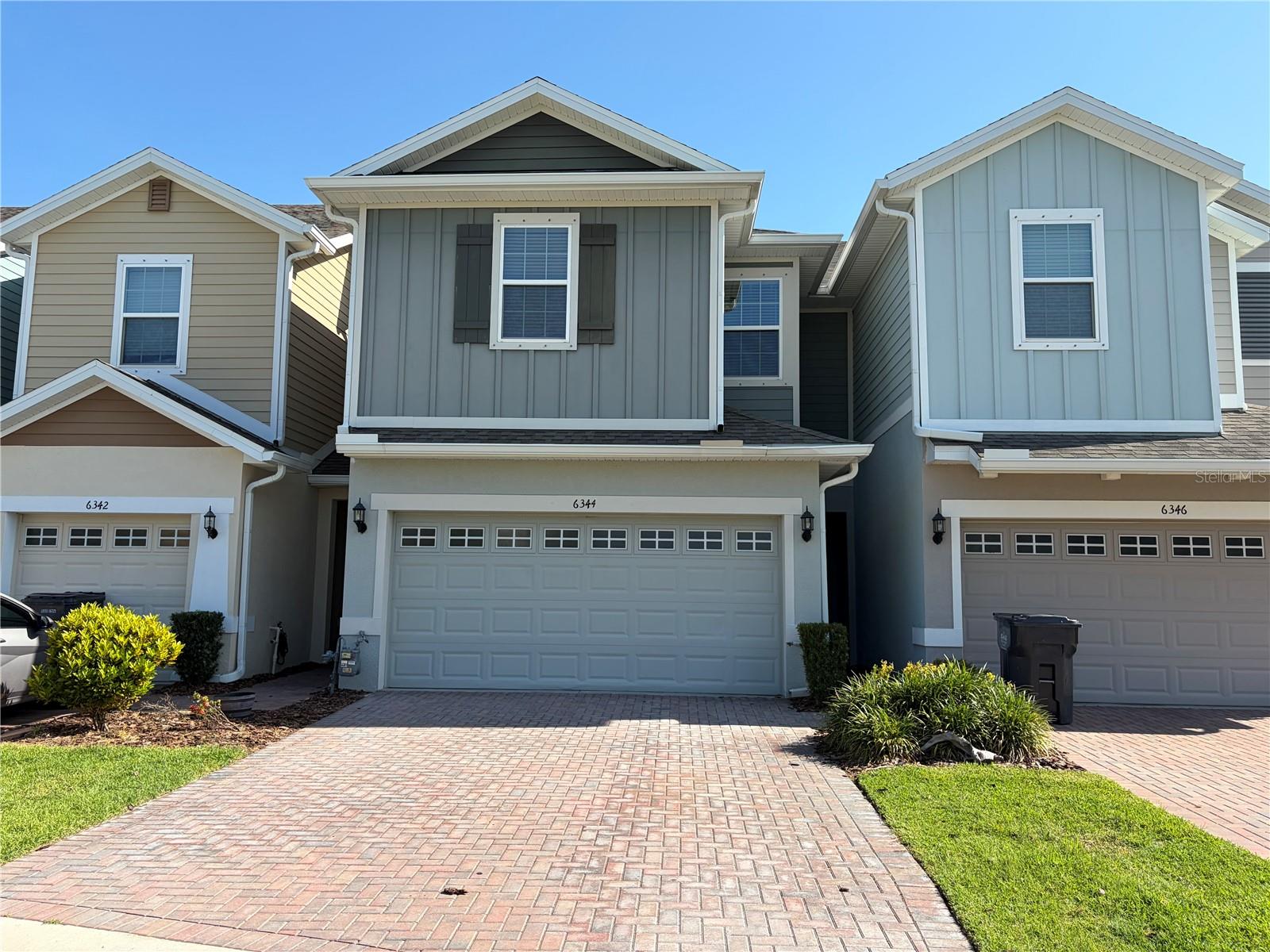 Townhome Located In The Highly Desirable Waterset Community Is Available NOW! 3 Bedrooms, 2.5 Bathrooms and 2 Car Garage With Pavers... tons of space in this maintenance-free townhome. You'll be impressed by the amazing townhome, your fully private screened-in back porch. Inside you won't feel like you are in a town home, large living area, open concept kitchen, dining and living makes the perfect place to host gatherings...KITCHEN with a large island, corian counter tops, GAS range, and tankless water heater....for utility savings $$$$ All Bedrooms are upstairs, Owners Bedroom is a great size, with a walk in closet and dual sink en suite. The Two other bedrooms are away from the owners suite,