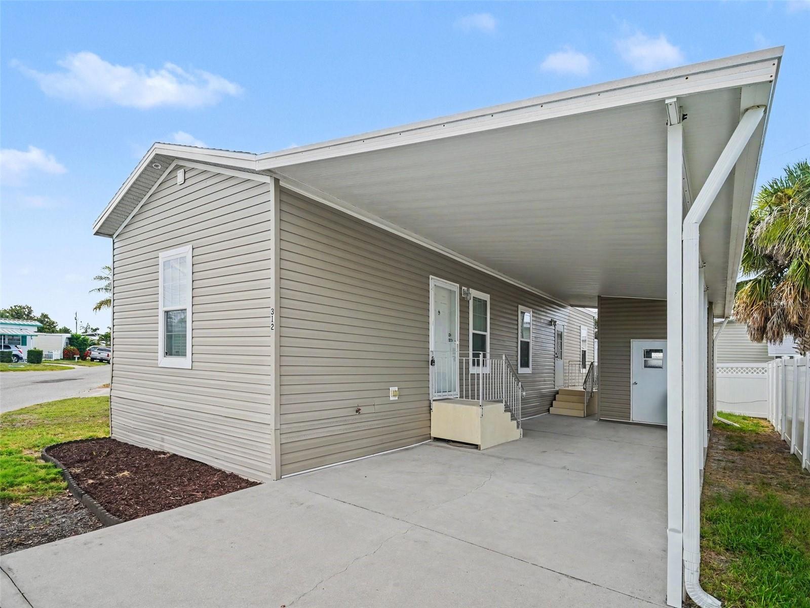 Affordable Florida living starts here! Welcome to this charming 2-bedroom, 1.5-bath home located in the desirable Floridana community, where you own the land and enjoy low monthly HOA fees. Built in 2015, this well-maintained home offers a bright and open floor plan with soaring 9-foot ceilings, tray ceilings, and crown molding throughout, creating a spacious and inviting feel.
The kitchen is equipped with stainless steel appliances, plenty of cabinet space, and a functional layout perfect for everyday living. The split-bedroom design offers privacy, while the covered carport and storage area add convenience and extra space.
Floridana is an all-ages, deed-restricted community with fantastic amenities including a heated pool, clubhouse, shuffleboard, and social activities. The low HOA covers water, sewer, trash, and community amenities, making for easy, low-maintenance living.
Perfectly located just minutes from shopping, dining, medical facilities, and only a short drive to the beautiful Gulf beaches of Anna Maria Island and the historic Cortez Fishing Village. Whether you’re looking for a full-time residence, seasonal getaway, or investment opportunity, this home offers the best of the Florida lifestyle at an affordable price.