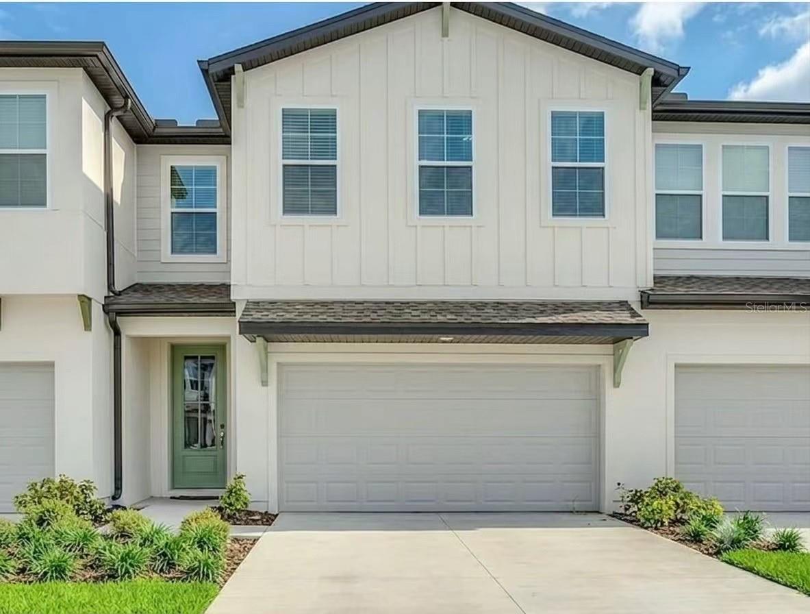 Located in the Enclaves at Festival, this beautiful 3 bed, 2.5 bath townhome will make a great vacation home, primary residence or investment property. It is being sold fully furnished and features an open concept floor plan, a 2-car garage and a beautiful conservation view. It boasts a kitchen with 42' cabinets, stone counter tops, stainless steel appliances and an island bar. The primary bedroom features a lovely sitting area and a bathroom with dual sinks, a walk-in shower and a large walk-in closet. The Enclaves at Festival boasts an incredible array of resort amenities just steps away, dive into the stunning community pool and water park, stay active at the fitness center and volleyball courts, or enjoy the arcade and 18-hole miniature golf course. The location is prefect, with easy highway access, a short drive to Disney and just minutes away from all the Champions Gate has to offer. Don't let this opportunity pass you by!