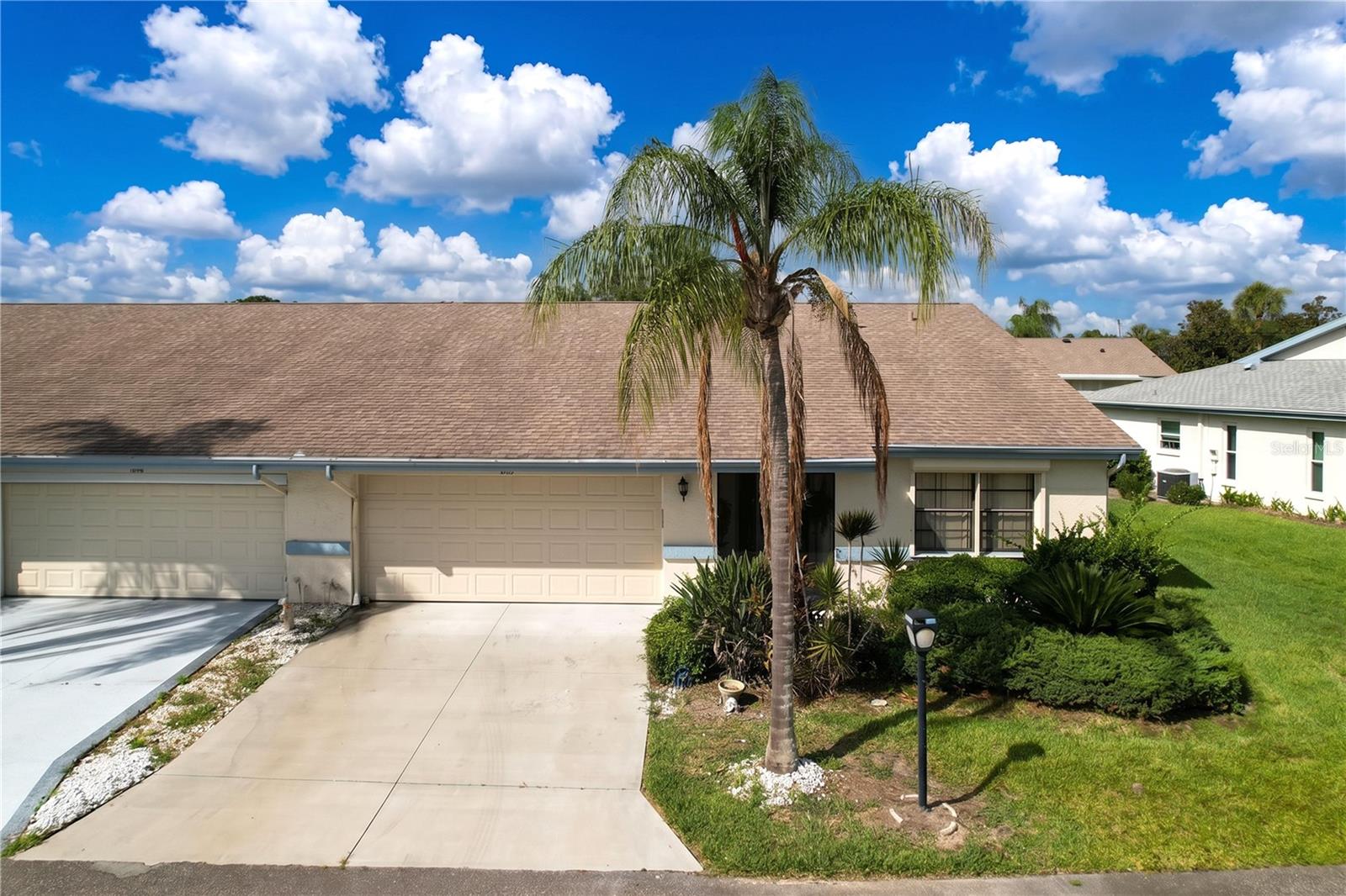 Paradise Found! Welcome to this beautifully maintained, fully furnished villa located in the renowned Kings Point neighborhood in Sun City Center, Florida; where comfort, convenience and an engaging lifestyle come together. This inviting home offers two bedrooms, two bathrooms plus a versatile bonus flex space ideal for home office, den or hobby room, along with a two-car garage. 
Enter the home through a private, covered patio entryway leading you to a grand foyer. The thoughtfully designed kitchen includes granite countertops, ample upgraded cabinetry, a large pantry, a gorgeous tile floor and opens seamlessly to the living and dining areas, making it ideal for both entertaining and everyday living. Hurricane shutters provide added protection and peace of mind. Ceiling fans throughout!  Both bathrooms are full baths, with the primary suite offering a well-appointed en-suite bathroom featuring a walk-in shower, second bathroom has a bathtub! The primary bedroom also includes an oversized walk-in closet, providing excellent storage and functionality. The guest bedroom and second full bathroom convey comfort and privacy for visitors. Step outside on the lanai where peaceful views and gentle breezes create the perfect way to relax, enjoy your morning coffee, or unwind in the evenings, complete with a light and ceiling fan! Washer, Dryer and utility sink are located in the garage, keeping the heat out of the house!
Offered fully furnished, this villa is turnkey (minus king mattress/box spring) and ready for immediate enjoyment, whether for seasonal or full-time living. Residents of this 55+ active community enjoy a vibrant, resort-style lifestyle with access to Golf, heated swimming pools, clubhouses, fitness center, and a wide variety of clubs, classes, and social activities designed to keep you active and connected. The gated setting provides both privacy and peace of mind, maintenance free living at it's finest! The monthly condo fee includes: exterior maintenance, landscaping, water, sewer, cable and access to exceptional resort-style amenities!  Ideally situated, the home is convenient to shopping, dining, medical facilities, and hospitals, with easy access to nearby parks and recreational areas. Residents also enjoy close proximity to the Gulf beaches and are within comfortable driving distance to Tampa, St. Petersburg, and Sarasota, offering endless options for entertainment, dining, and cultural attractions. This location provides the perfect balance of relaxed living and access to everything the Florida lifestyle has in store!