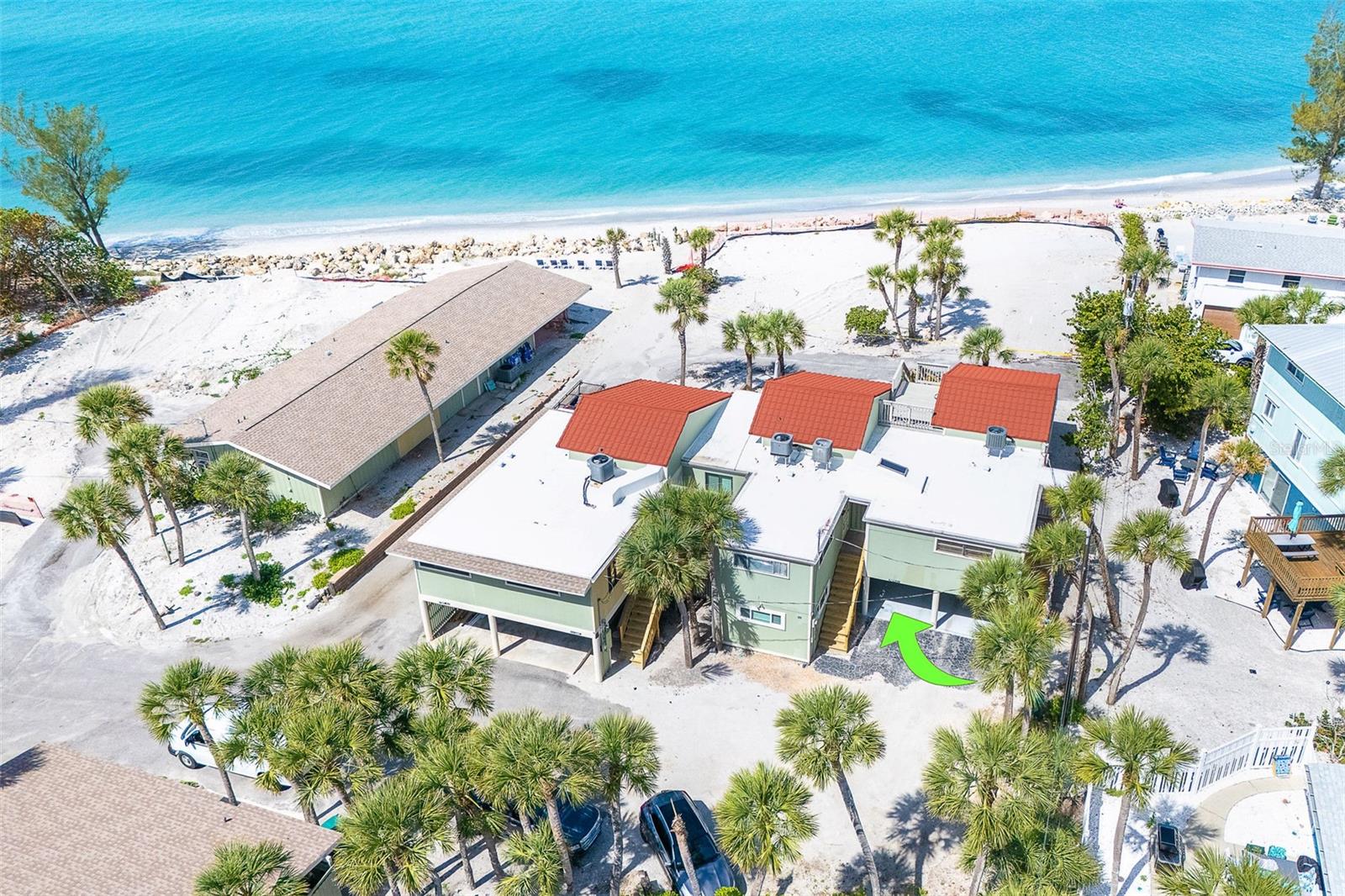 Coastal charm meets modern comfort just steps from the Gulf of Mexico at Admiralty Villas Condominiums. This beautifully updated ground-floor 2-bedroom, 2-bath condo offers the perfect opportunity for a full-time residence, seasonal retreat, or income-producing investment. Completely renovated, the unit features all-new appliances, a new AC system, and a new water heater, giving buyers peace of mind from day one. Inside, you’ll find easy-maintenance tile flooring throughout, generous storage space, and the convenience of a full-sized washer and dryer right inside the unit, no shared laundry here. An assigned covered parking space is also included. Enjoy the laid-back “Old Florida” atmosphere of Admiralty Villas, complete with a heated community pool and clubhouse, all within walking distance to the beach and less than a mile from popular waterfront restaurants and island favorites. Spend your days boating, golfing, shelling, or soaking in breathtaking Gulf sunsets, all just moments from your front door. Whether you’re looking for an affordable beach getaway, a smart investment opportunity, or your own slice of paradise, this condo delivers coastal living at an exceptional value. Plus, baseball fans will appreciate the close proximity to Atlanta Braves spring training facilities.