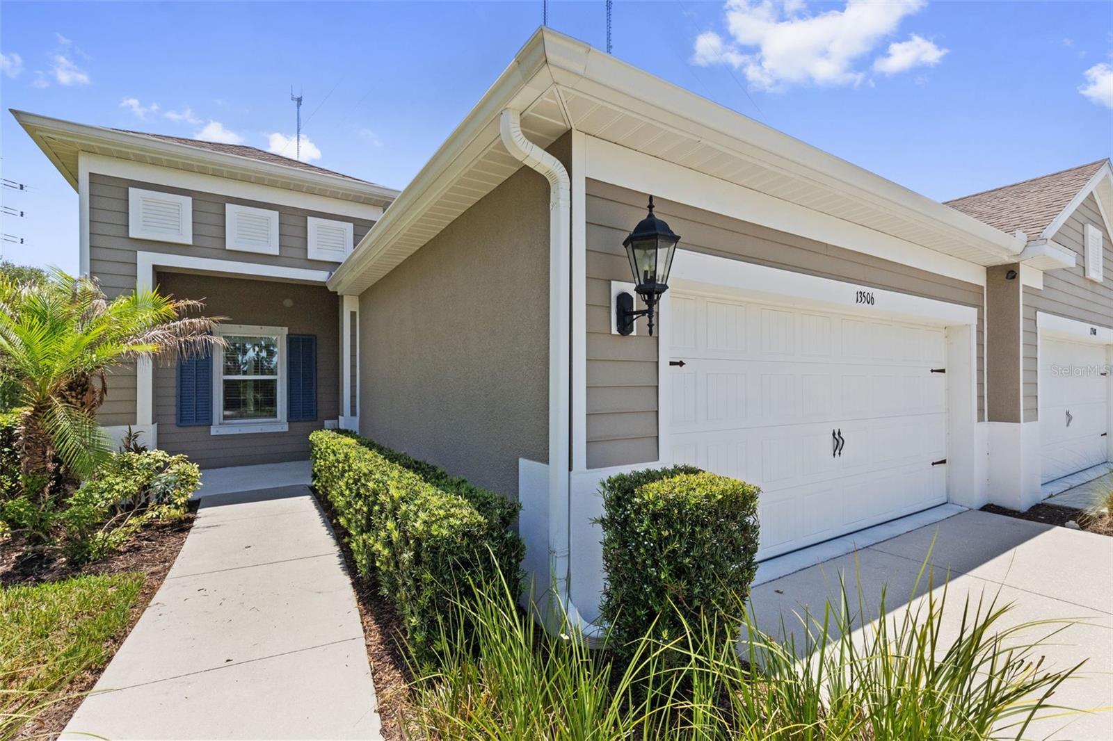 Virtually Staged. Some homes just feel right the moment you walk in.
Nestled at the end of a quiet cul-de-sac in the gated villa community of Sagewood at FishHawk Ranch West, this beautifully maintained 2-bedroom, 2-bath home with a dedicated office checks every box without the compromise. Light, airy, and move-in ready, it lives larger than it looks.
From the moment you arrive, the covered front porch and manicured landscaping set the tone for what's inside. Plantation shutters, wood-look tile throughout, and a neutral palette give the home a clean, curated feel that's as easy to love as it is to maintain.
The heart of the home is the kitchen, and this one delivers. Stone counters, white shaker cabinets with crown molding, a subway tile backsplash, stainless appliances, and a generous center island with breakfast bar seating make cooking and entertaining equally enjoyable. The open flow between the kitchen, dining, and family room means you're always part of the conversation, whether you're hosting friends or enjoying a quiet evening in.
Tray ceilings in the family room add an elevated touch, and the sliding glass doors open to a screened, covered lanai where you can actually enjoy the Florida lifestyle without the Florida sun beating down on you.
The primary suite is tucked privately at the back of the home and features dual closets and a spa-inspired bath with separate vanities and a walk-in shower. The second bedroom sits at the front of the home with its own walk-in closet and full bath, making it ideal for a guest suite or a home office overflow.
And the lifestyle here? It comes with the home. Resort-style pool and splash pad, fitness center, lakehouse recreation area, park, and playground are all within walking distance. Top-rated Hillsborough County schools round out the package.
This is the one you've been waiting for. Schedule your private showing today.