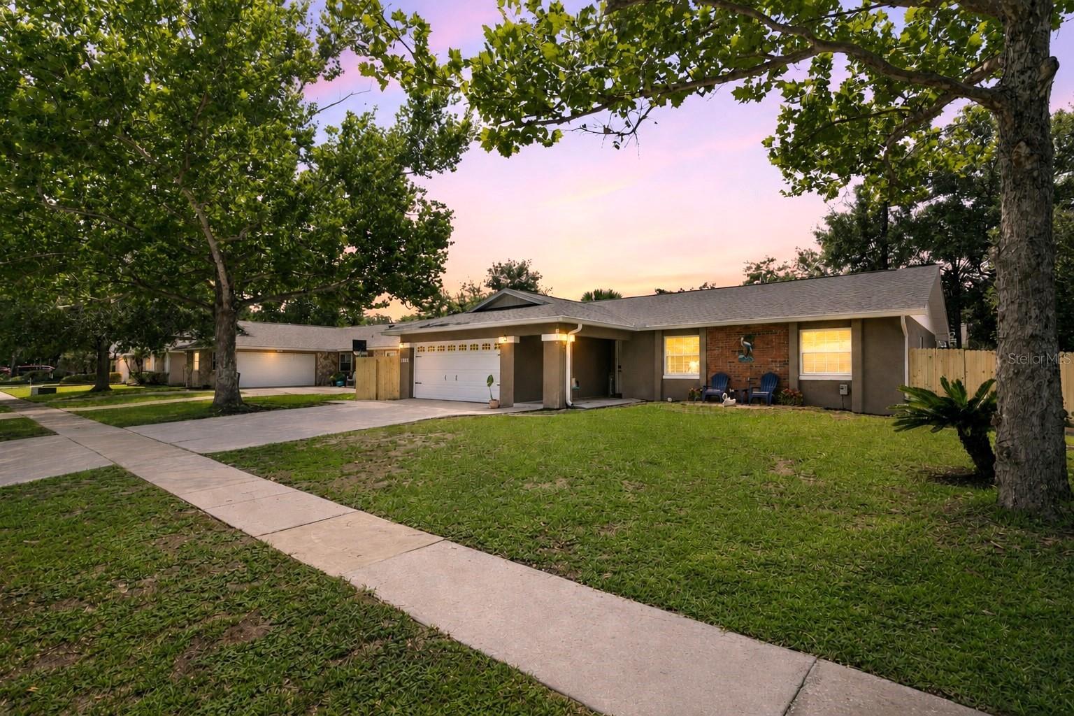 Welcome home to this beautifully renovated 4-bedroom, 2-bath residence offering approximately 2,250 square feet of thoughtfully designed living space in the highly desirable Oak Forest subdivision. From the moment you arrive, you'll appreciate the exceptional care and attention to detail that make this home truly move-in ready.
The open-concept floor plan creates a bright and inviting atmosphere, perfect for both everyday living and entertaining. Luxury vinyl and tile flooring flow throughout the home, providing style, durability, and easy maintenance with no carpet to worry about.

At the heart of the home is a stunning, fully renovated kitchen featuring quartz countertops, soft-close cabinetry, convenient pull-out drawers, and high-quality appliances that will delight any home chef. The spacious living and dining areas seamlessly connect to the Family Room, where vaulted ceilings, abundant windows, and natural light create a warm and welcoming gathering space. A wet bar complete with a bar refrigerator makes entertaining family and friends effortless.

The spacious primary suite offers a beautifully updated bathroom with quartz countertops and a luxurious walk-in shower featuring a rainfall shower head. The secondary bedrooms are generously sized, and the guest bathroom has also been tastefully renovated with quality finishes.

Step outside to your backyard retreat, thoughtfully designed for relaxation and entertaining while the cozy fire pit creates the perfect setting for enjoying cool Florida evenings.

Major updates provide peace of mind for years to come, including a new roof installed in 2026, new soffits and gutters, new windows, a new water heater, complete repiping, and a new electrical breaker panel, AC installed in 2020.  The garage floor has been freshly coated, adding to the home's clean and polished appearance.

Ideally located near shopping, restaurants, medical facilities, and major roadways including SR 436, SR 434, and SR 417, this home offers exceptional convenience for commuting and daily living. Residents will also appreciate access to highly regarded schools.

This meticulously maintained home combines modern upgrades, quality craftsmanship, exceptional outdoor living space, and an unbeatable location—making it a rare opportunity in Oak Forest.