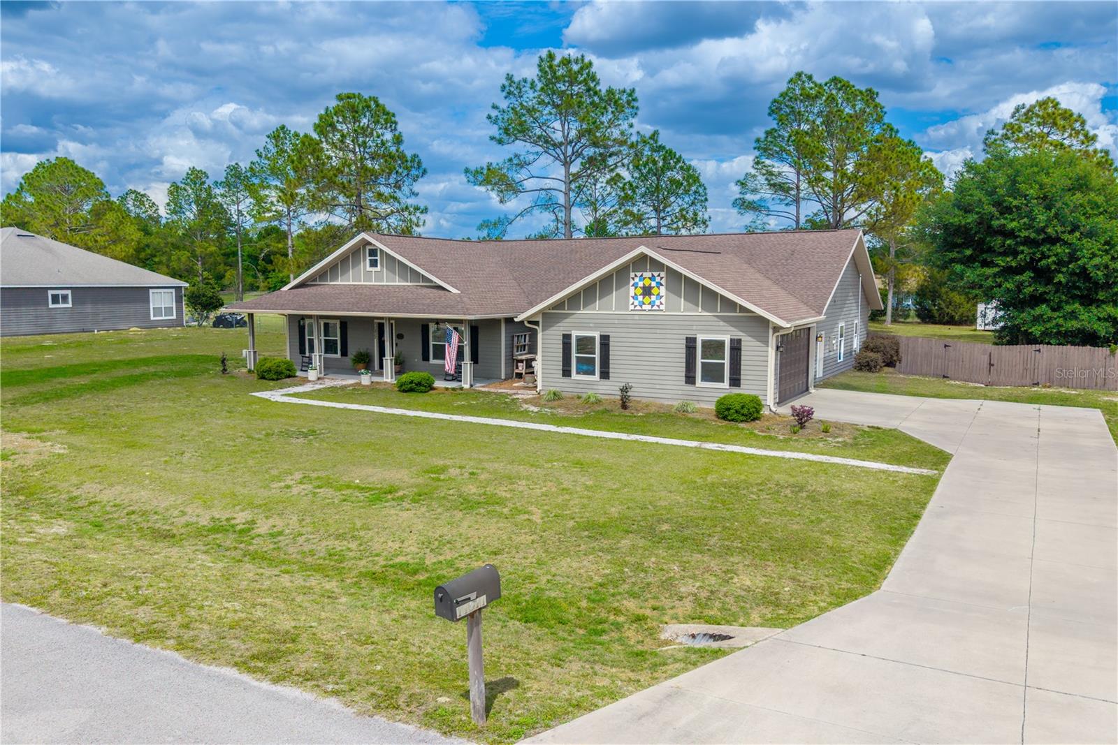 Welcome to Buck Bay—where space, privacy, and standout features come together on a full acre. This impressive 3,900 sq ft custom-built home offers 4 bedrooms, 2 bathrooms, and the kind of scale and presence that’s getting harder to find.

From the moment you pull up, the curb appeal delivers—inviting front porch and a home that feels solid and thoughtfully designed. Step inside to an open, light-filled layout with soaring ceilings, expansive living areas, and oversized windows that bring the outdoors in.

The main living space is built for both everyday living and entertaining, with a seamless flow that makes hosting easy. The primary suite is a true retreat—spacious and private, featuring dual walk-in closets, double vanities, a soaking claw foot tub, and a separate walk-in shower.

All four bedrooms are generously sized, with the fourth bedroom offering flexibility to easily convert into a game room, media space, or whatever fits your needs.

Step out back and this is where the home really separates itself—a large covered back porch perfect for year-round enjoyment, complete with an outdoor sink that adds both convenience and function. Whether you're entertaining, cooking, or just relaxing, this space is a major highlight.

Situated on a full acre, there’s plenty of room to spread out, add a pool, or create your ideal outdoor setup—all while enjoying the quiet, sought-after setting of Buck Bay.
Enjoy easy access to:

Suwannee River boating, fishing, and kayaking
Natural springs and crystal-clear swimming spots
Multiple RV parks and campgrounds
Boat ramps and public access points
The growing conveniences of nearby Chiefland