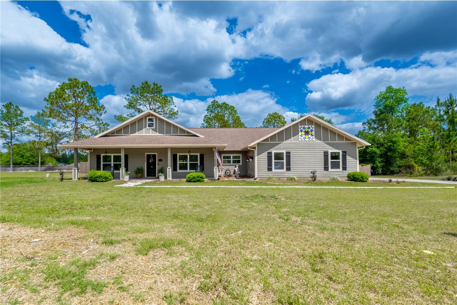 Seller offering buyer concessions toward closing costs, prepaid expenses, or an interest rate buy-down.
Welcome to Buck Bay—where space, privacy, and standout features come together on a full acre. This impressive 3,900 sq ft custom-built home offers 4 bedrooms, 2 bathrooms, and the kind of scale and presence that’s getting harder to find.

From the moment you pull up, the curb appeal delivers—inviting front porch and a home that feels solid and thoughtfully designed. Step inside to an open, light-filled layout with soaring ceilings, expansive living areas, and oversized windows that bring the outdoors in.

The main living space is built for both everyday living and entertaining, with a seamless flow that makes hosting easy. The primary suite is a true retreat—spacious and private, featuring dual walk-in closets, double vanities, a soaking claw foot tub, and a separate walk-in shower.

All four bedrooms are generously sized, with the fourth bedroom offering flexibility to easily convert into a game room, media space, or whatever fits your needs.

Step out back and this is where the home really separates itself—a large covered back porch perfect for year-round enjoyment, complete with an outdoor sink that adds both convenience and function. Whether you're entertaining, cooking, or just relaxing, this space is a major highlight.

Situated on a full acre, there’s plenty of room to spread out, add a pool, or create your ideal outdoor setup—all while enjoying the quiet, sought-after setting of Buck Bay.
Enjoy easy access to:

Suwannee River boating, fishing, and kayaking
Natural springs and crystal-clear swimming spots
Multiple RV parks and campgrounds
Boat ramps and public access points
The growing conveniences of nearby Chiefland