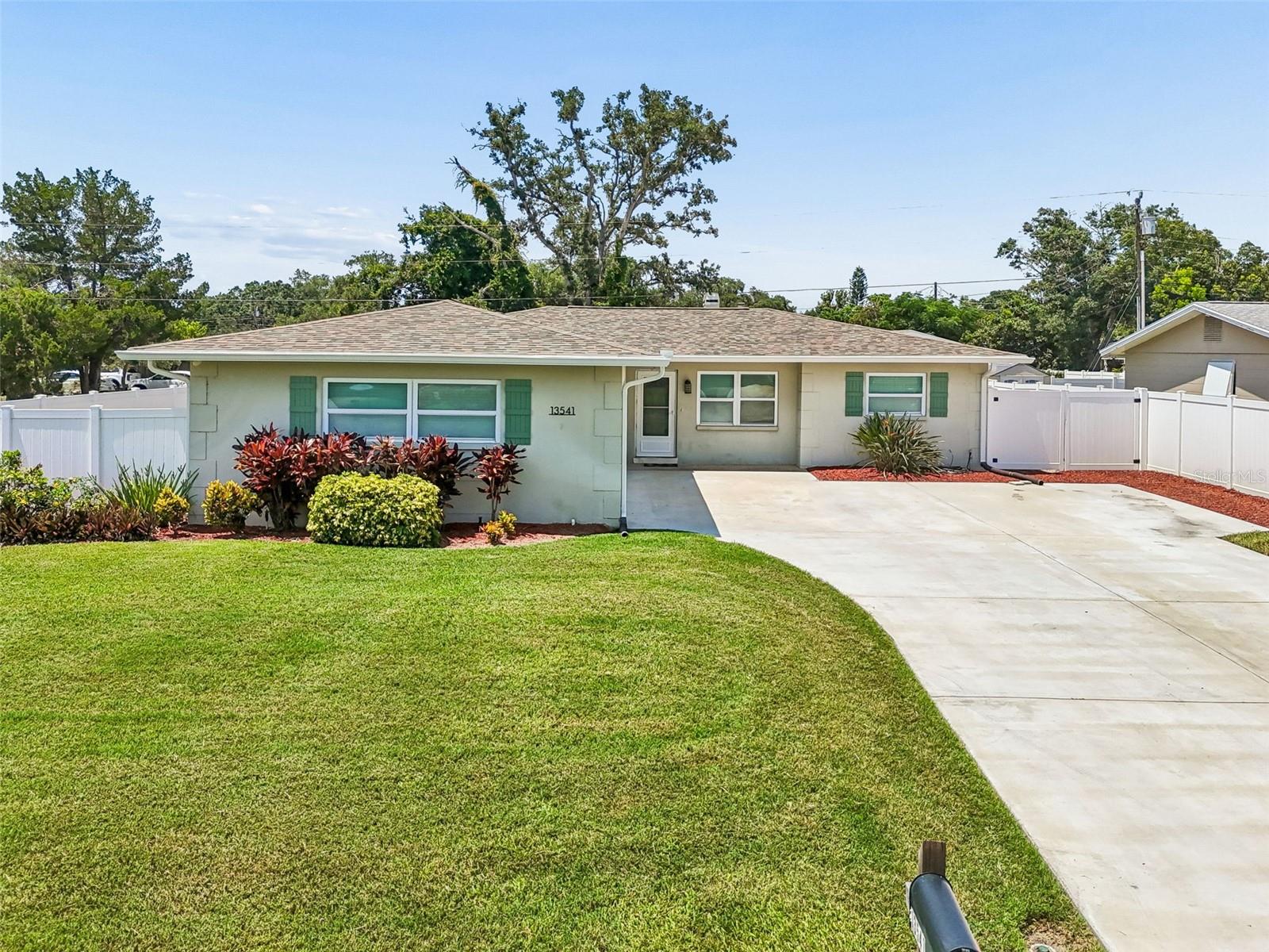 Under contract-accepting backup offers. Nestled on a beautifully landscaped corner lot in desirable Oakhurst Terrace, this move-in ready Seminole home offers the perfect blend of comfort, functionality, and peace of mind. Featuring 3 bedrooms, 2 bathrooms, a 2-car garage, and a desirable split-bedroom floor plan, and spacious driveway parking space for your boat, RV, or recreational vehicles, all in a non-flood zone.
The kitchen is equipped with newer stainless steel appliances and opens to inviting living spaces finished with timeless travertine flooring throughout. The home also includes a spacious bonus living area at the rear of the home, ideal for entertaining, working from home, or simply spreading out. Outside, the fully fenced yard boasts a new white vinyl privacy fence. 
Major improvements have already been completed for the next owner, including a NEW ROOF (2025), HVAC system (2019), tankless water heater (2021), water softener (2021), upgraded ductwork with additional insulation, new driveway, vinyl fencing, and updated exterior doors.
Conveniently located within the highly sought-after Seminole school district and just minutes from Gulf beaches, boat ramps, shopping, dining, and everyday conveniences, this move-in ready home offers the perfect combination of comfort, functionality, and peace of mind.