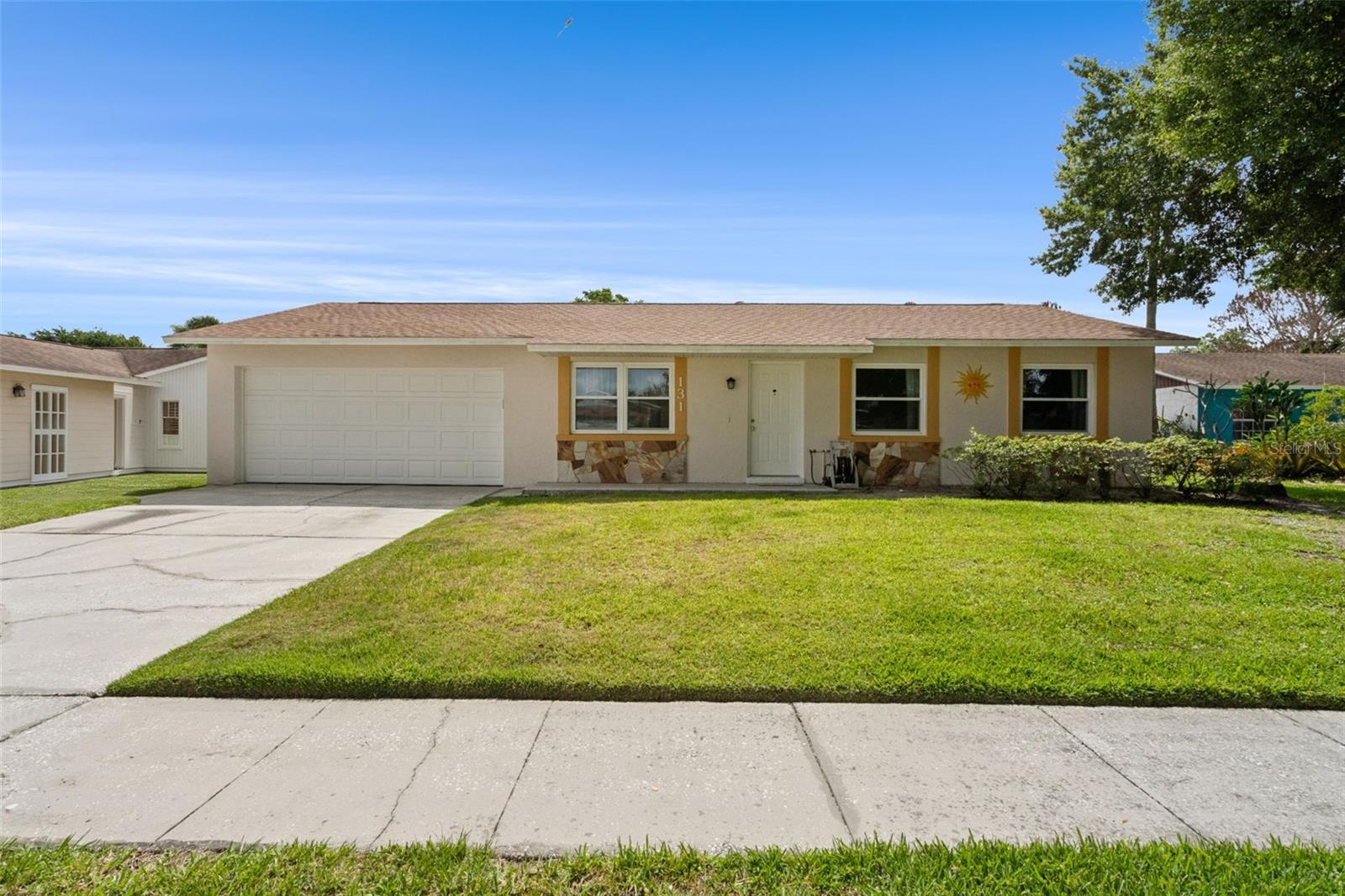 Florida Living at its BEST in this 3 bedroom, 2 bath, screened heated pool w/jacuzzi home. As you enter the front door into the original living room w/engineered wood flooring your eyes will immediately take you to the custom built eat-in kitchen with a large island adorned with a beautiful Granite counter top. The island can seat 3 comfortably and is perfect for baking your favorite breads and has 6 soft-close drawers for your storage needs. The island also comes w/built-in shelving for all your favorite cookbooks. To your left you will see a 7' 4 panel door pantry with pull-out drawers for ease of use. A bit further to your right you will see a glass front butler pantry/cabinet great for prepping, staging meals and storing your fine china. Butler pantry continues with the same beautiful Granite and more soft touch drawers and doors. Kitchen appliances are all Frigidaire stainless steel and all convey, including the side-by-side refrigerator.  
After your tour of the custom kitchen you will step through a set of French Doors into a 15'x30' fantastic family room with fireplace. The fireplace has REAL Florida Stone Rock with a beautiful custom-built Pecan wood backwall accompanied with a custom-built mantel. The exquisite Pecan wood continues in the ceiling beams, baseboards and door frames creating a warm high-quality aesthetic appeal. The fireplace is currently used as an electric fireplace which produces plenty of heat but can be converted back to woodburning.
For the ultimate in Florida Living, step through the sliding glass door off the family room to your outdoor living space oasis. This 16'x25' covered patio with TV and 2 ceiling fans is only the beginning. Now look out to the birdcage screened heated pool, jacuzzi, and tropical landscaping. For maximum family FUN and ambience turn on the LED colored lights with 15 different color options.
In your Master bedroom en suite you'll feel the softness of new carpet under your feet and you'll see the dual his and her wall closets. 
Now, walk thru the French Door off the Master bedroom back outdoors to your enclosed pool sanctuary ready for a midnight dip or a relaxing moment in the jacuzzi. Not a bad place to start your day with a cup of coffee, too.
Added outdoor features include private backyard with new 6' vinyl fencing, an outdoor shower for a cool rinsing off, pool storage garage, parking pad for a jet ski, boat or RV, 10x12 storage shed and two delicious peach trees. 
Freshly painted 2 car garage comes with a 7x8 bonus room w/electricity, separate laundry area w/Samsung top loader washer and dryer, both convey. Across from the washer and dryer and next to the electric hot water tank is a laundry tub/utility sink. Topping the garage off is an approx. 16'x20' wooden floor attic w/attic fan and pull down ladder for ALL your storage needs.
Special features include: Newly painted exterior and interior, all interior walls are textured, AC 2018, Roof 2023, replumbed 2016, double pane windows 2023, Lift Master Ele. garage door opener and keypad 2024, new pool motor pump and hose 2026. Tab fed pool system for EZ maintenance, new carpet in all bedrooms 2026, Underground utilities and surge protector on house thru Duke Energy for $6.99/mth. Pls. confirm current pricing. 
Sellers have enjoyed this home for 31 years, and have kept meticulous records of all maintenance and upkeep. 
Approximately 10 minutes walking distance is Yucatan Park. 
This home is absolutely Turn-Key ready!