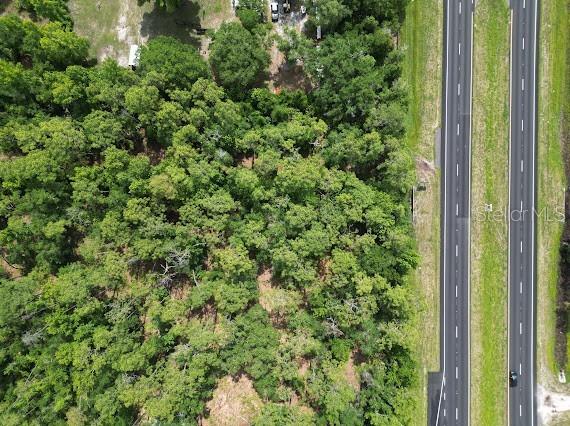 Endless possibilities start here with 1.59 acres of opportunity located on East Colonial Drive in Christmas. With excellent frontage and visibility, this property offers a unique opportunity for future development, investment, or a private homesite with convenient access to surrounding areas. The spacious lot provides room to bring your vision to life. Conveniently located near major roadways, outdoor recreation, and growing development throughout the area, this property combines space, accessibility, and opportunity in one location. ALL INFORMATION CONTAINED HEREIN IS FROM SOURCES DEEMED RELIABLE, HOWEVER, NO REPRESENTATION OR WARRANTY IS MADE TO THE ACCURACY THEREOF.