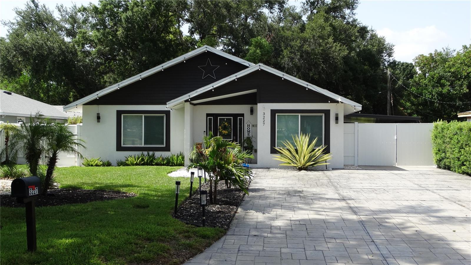 Beautiful Custom Home Built in 2016!

This exceptional custom-built home was constructed in 2016, although the county records reflect an original year of 1966. The original structure was demolished. The home was then completely rebuilt in 2016, professionally designed by an architect, fully permitted, and constructed with all required City approvals.

Meticulously maintained, this beautiful home features 4 bedrooms, 2 full bathrooms, an open-concept floor plan, vaulted ceilings, walk-in closets, tile flooring throughout, granite countertops, quality finishes, and abundant natural light. Every detail reflects pride of ownership and thoughtful design. The home is equipped with hurricane-impact windows for added safety, energy efficiency, and peace of mind.

Situated on an oversized lot, the backyard is a private tropical retreat. Enjoy the beautiful wood deck surrounded by lush tropical landscaping, mature palm trees, and colorful plants that create a peaceful, resort-like atmosphere. Relax on the screened lanai while listening to the birds or gazing at the stars on peaceful Florida evenings. The expansive outdoor space offers plenty of room for entertaining, or gardening.

No HOA. No CDD fees. Not located in a flood zone.

Ideally located directly across the street from a beautiful park, this home is minutes to Midtown Tampa, Tampa International Airport and Downtown Tampa. You'll also enjoy convenient access to schools, restaurants, shopping, entertainment, and major highways, making this home the perfect combination of comfort, quality, and convenience.

Don't miss this rare opportunity to own a beautifully built custom home in one of Tampa's most desirable and centrally located areas. Schedule your private showing today!
