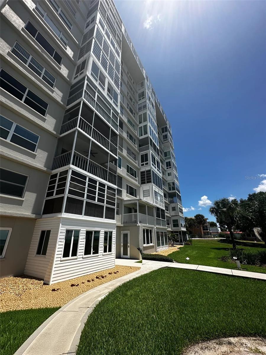 One or more photo(s) has been virtually staged. Wake up to breathtaking panoramic water views and end your day watching vibrant Florida sunsets from your private, screened-in patio. Perched perfectly on the 4th floor with the convenience of two ELEVATORS, this beautifully positioned 2-bedroom, 2-bath condo at Fountainhead is the ultimate design for relaxing, low-maintenance living. Step outside and immerse yourself in a true lakefront lifestyle, featuring a private community dock, fantastic fishing spots, and a rare, designated sandy swimming area right on the lake. Whether you are unwinding on the patio, casting a line from the dock, or relaxing by the sparkling pool, this property feels like a permanent vacation. Inside, massive windows flood the spacious, open floor plan with natural light, keeping the water your main focal point. Complete with an assigned parking space right by the entrance, extra storage, and handy community laundry, it offers effortless lock-and-leave convenience. All this is just minutes from historic downtown Sebring's vibrant dining and shopping. Turn-key, relaxing, and ready for you to live the lake life!