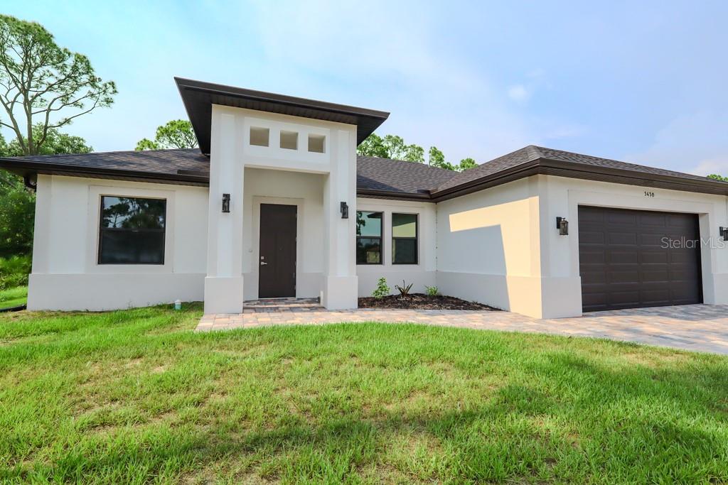 Welcome to your brand-new home at 5438 Sylvania Ave in North Port, FL! This beautifully crafted new construction offers the perfect blend of modern style and everyday comfort.

Step inside to discover a bright, open-concept layout designed for easy living and entertaining. The home features high-quality finishes throughout, with a seamless flow between the living, dining, and kitchen areas. The kitchen is thoughtfully designed with modern touches, ample cabinetry, and plenty of counter space—perfect for both daily use and hosting guests.

The spacious bedrooms provide a relaxing retreat, while the bathrooms showcase sleek, contemporary design. The primary suite is a true highlight, featuring a dual sink vanity in the master bathroom and a generous walk-in closet, offering both comfort and convenience.

Every detail of this home has been carefully considered to provide a clean, modern feel with lasting quality. Enjoy the peace of mind that comes with new construction—everything is fresh, efficient, and move-in ready.

Located in a growing area of North Port, you’ll have easy access to shopping, dining, and beautiful Gulf Coast beaches.

Don’t miss the opportunity to own this stunning new construction—schedule your showing today!