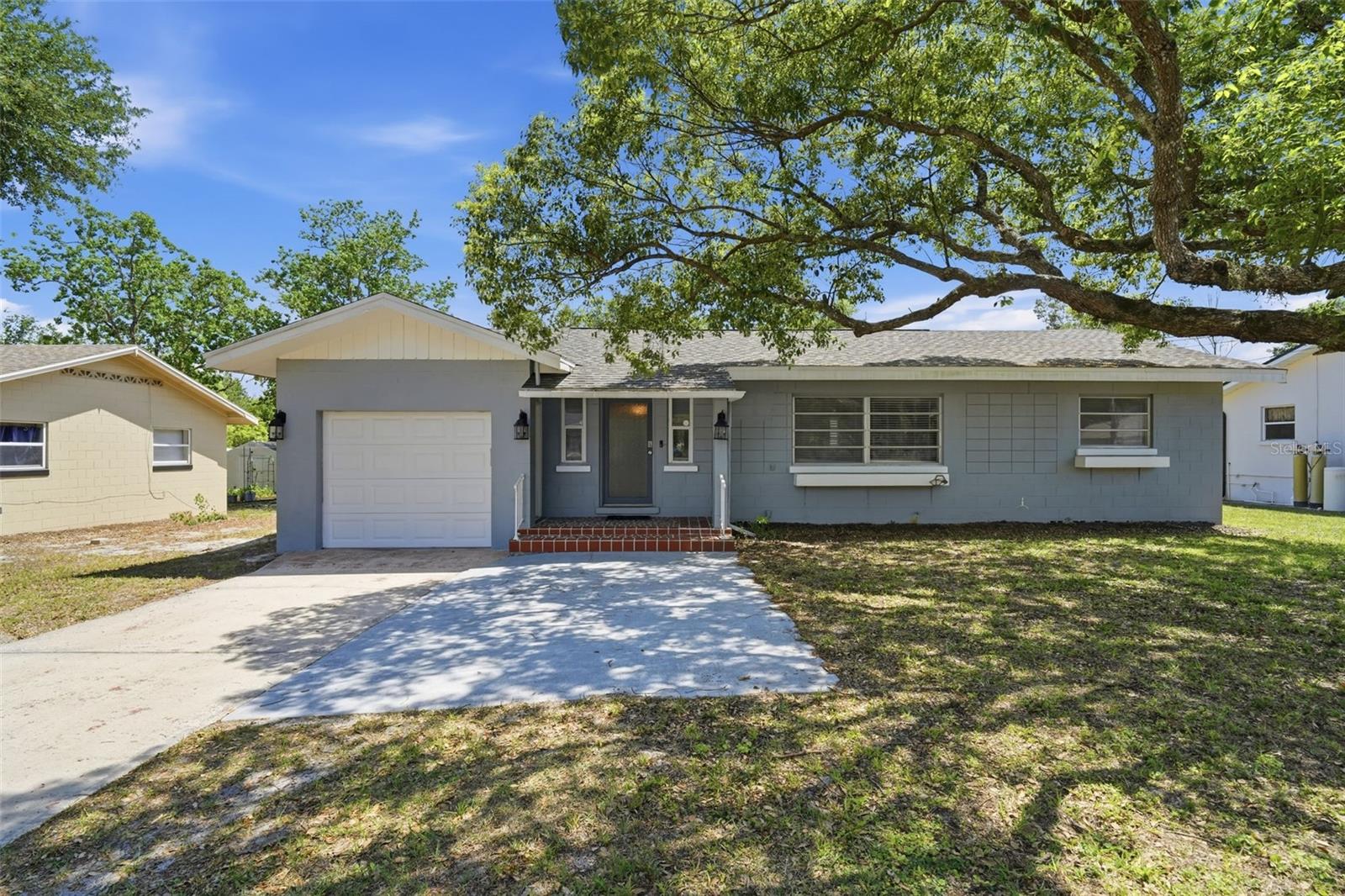 Welcome to this nicely updated 3-bedroom home, perfectly situated on a ¼ acre fenced lot on a quiet cul-de-sac. From the terra-cotta front porch, step inside to a spacious open floor plan featuring original hardwood floors, a beautifully updated kitchen with soft-close cabinets, subway tile backsplash, granite countertops, and an oversized island/breakfast bar ideal for family gatherings. The Kitchen and dining area offers sliders leading to a spacious screened porch with ceiling fans, overlooking the oversized backyard with a storage shed/workshop. Additional features include a spacious one-car garage and convenient location just minutes from 17-92, I-4, and the Sun Rail. Call for more details or to schedule your showing!