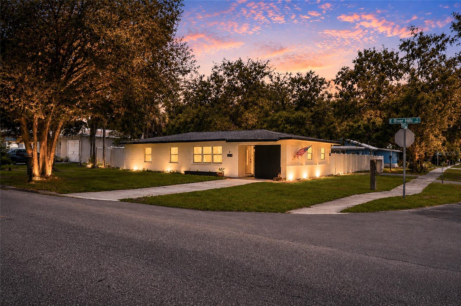 Turnkey and truly move-in ready, this fully remodeled 4 bedroom, 3 bath home at 4015 River Hills Dr, Tampa, FL 33617, sits in the established River Hills neighborhood and shows like new from the moment you walk in. The interior has been completely refreshed with a bright, modern aesthetic and luxury vinyl plank flooring throughout, plus the big-ticket items are already handled with a 2017 roof and 2017 A/C system. A standout feature is the fourth bedroom suite, set up with its own private entrance through the backyard and separate from the main living area, giving buyers a flexible bonus space for a home office, guest quarters, extended living space, or rental income potential, short-term or long-term. The main home offers comfortable living and dining areas, a functional kitchen, and additional bedrooms and bathrooms throughout, all on a landscaped lot in a quiet, tree-lined setting convenient to I-275 and I-75 for easy access across the greater Tampa Bay area. The location adds even more appeal. Lettuce Lake Conservation Park, with boardwalk trails, a fishing pier, canoe and kayak launch, and playground, is approximately 2 to 3 miles away. Flatwoods Park, known for its paved multi-use trail for walking, running, and biking, is approximately 7 to 8 miles away. The University of South Florida main campus is approximately 3 to 4 miles away. Major medical centers are close by, including AdventHealth Tampa, approximately 5 to 6 miles away, James A. Haley Veterans' Hospital, approximately 4 to 5 miles away, and Moffitt Cancer Center on the USF campus, approximately 6 to 7 miles away. Shopping and dining are plentiful along Fowler Avenue and Bruce B. Downs Boulevard, approximately 2 to 4 miles away, with University Mall and additional retail centers approximately 3 to 5 miles away, and Tampa Premium Outlets approximately 9 to 10 miles away. For entertainment, Busch Gardens Tampa Bay and Adventure Island water park are 1.6 miles away. Downtown Tampa, with its museums, performing arts venues, Riverwalk, and Amalie Arena, is approximately 10 to 12 miles away. Tampa International Airport is approximately 15 to 17 miles away, roughly a 20 to 25 minute drive. Gulf Coast beaches, including Clearwater Beach, are approximately 30 to 35 miles away, roughly a 45 to 55 minute drive, and the Courtney Campbell Causeway recreational trail along Tampa Bay is approximately 12 to 15 miles away. This is a rare combination of a pristine, updated home with quick access to major hospitals and medical centers, higher education, shopping, entertainment, outdoor recreation, and regional transportation. Schedule a showing to see it in person. All distances and times are approximate; potential tenant to confirm.