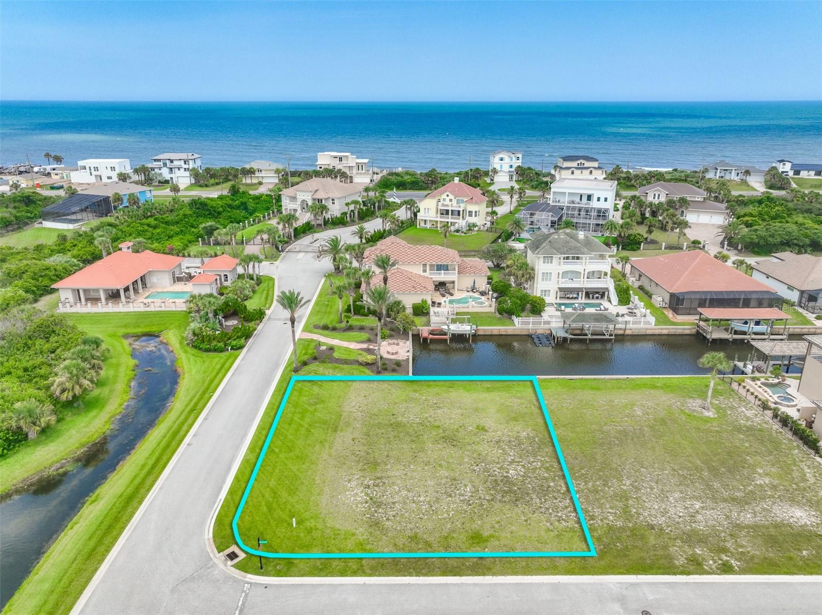 Waterfront Living Starts Here!

Build the coastal home you’ve always envisioned on this oversized corner waterfront homesite in the exclusive, gated community of Shelter Cove with a community pool! Located at 60 Malibu Cove, this exceptional lot offers a bulkheaded saltwater canal frontage with direct access to the Intracoastal Waterway, making it a dream location for boaters, anglers, kayakers, and paddleboard enthusiasts.

The generous corner lot provides an expanded building footprint, giving you the flexibility to design a spacious custom home with room for a pool, outdoor entertaining, and all the features you’ve been dreaming of. Add your own private dock or fishing pier and enjoy effortless days on the water just steps from your backyard.

Tucked away in a private, secluded community just off scenic A1A, you’ll enjoy the peaceful coastal lifestyle while still being close enough to hear the soothing sound of the Atlantic Ocean. Spend your mornings watching dolphins in the Intracoastal, afternoons fishing from your dock, and evenings relaxing with ocean breezes.

Location is everything:

Bulkheaded saltwater canal with direct Intracoastal access
Oversized corner lot offering a larger home footprint
Build your private boat dock or fishing pier
Gated, private waterfront community
Minutes to Flagler Beach’s restaurants, shopping, and beaches
Approximately 30 minutes to historic St. Augustine
Approximately 30 minutes to Daytona Beach
Just over an hour to Orlando’s world-famous attractions and international airport

Whether you’re looking for the perfect place to build your forever home, a luxurious coastal retreat, or an investment in one of Flagler County’s premier waterfront communities, 60 Malibu Cove offers a rare opportunity to enjoy the very best of Florida waterfront living.