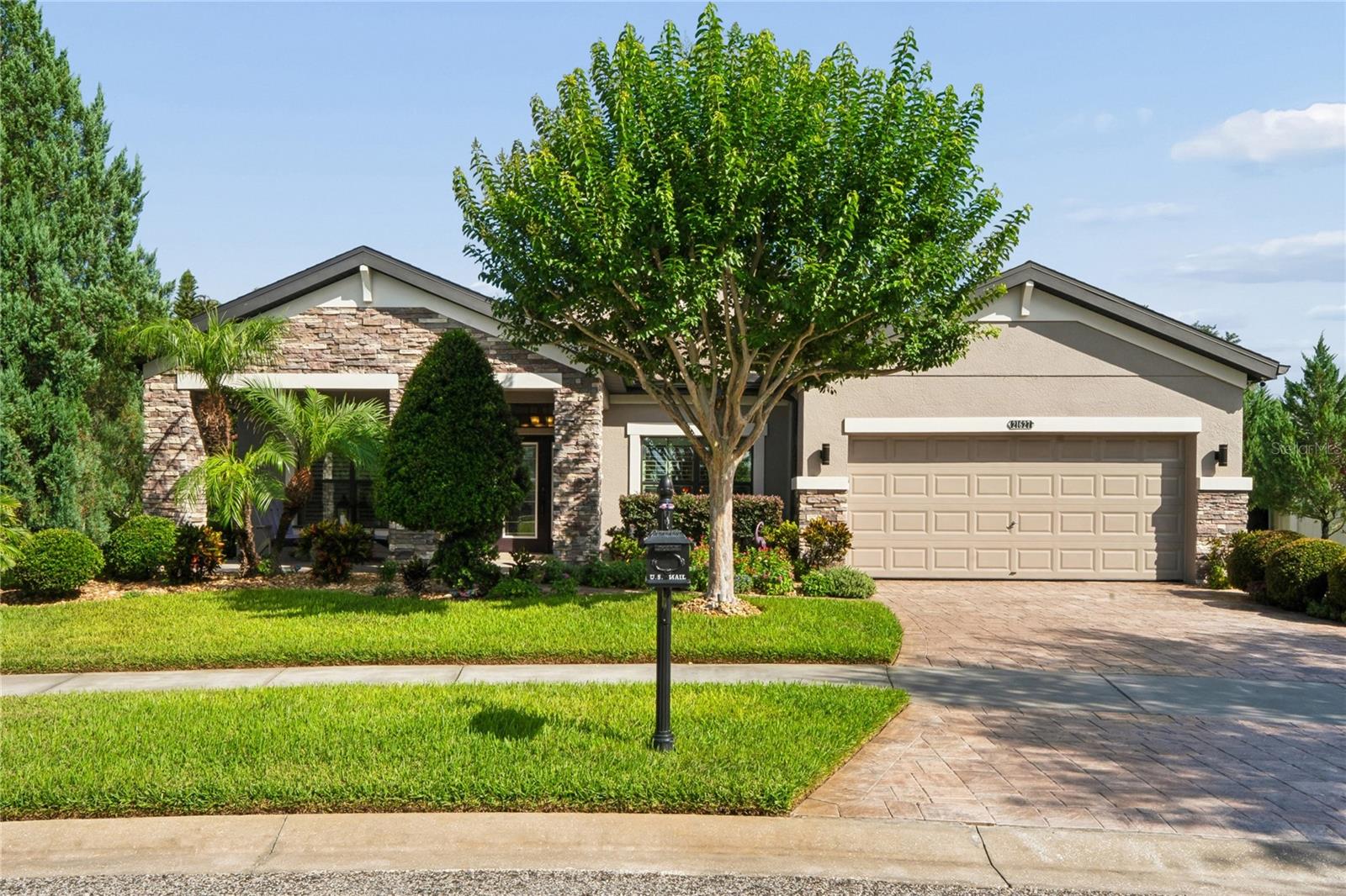Welcome to one of the most desirable homes in Connerton, offering what may be the best view in the community! Perfectly positioned on a quiet cul-de-sac, this meticulously maintained, one-owner MI Home showcases breathtaking conservation and pond views, exceptional privacy, and an impressive list of upgrades throughout.
Built in 2013, this single-story residence features 3 bedrooms, a dedicated den, 2 full baths, 1 half bath, and a 3-car tandem garage across approximately 2,408 square feet of thoughtfully designed living space. The open-concept floor plan is enhanced by soaring coffered and tray ceilings, abundant natural light, porcelain tile flooring throughout, plantation shutters, crown molding, upgraded lighting, and custom finishes at every turn.
The gourmet kitchen is a chef's dream, featuring quartz countertops, a farmhouse sink, upgraded cabinetry with pull-out drawers, premium LG appliances, and a Bosch dishwasher. The spacious living and dining areas flow seamlessly to the extended screened lanai, where you'll enjoy stunning water and conservation views year-round. The lanai features sealed travertine flooring and opens to an additional paver patio plumbed for gas, creating the perfect outdoor entertaining space.
Additional upgrades include a 3-car tandem garage with epoxy flooring, aluminum pull-down attic stairs, water softener, 50-gallon water heater, electronic front door lock, double-pane windows, added insulation, and beautifully upgraded Florida-friendly landscaping in both the front and rear yards.
Located in the highly sought-after Connerton community, residents enjoy resort-style amenities including pools, fitness facilities, walking trails, parks, playgrounds, and community gathering spaces. Conveniently located near shopping, dining, schools, and major commuter routes.
Too many upgrades to list—be sure to review the attached feature sheet for the complete list of enhancements. This is a rare opportunity to own one of Connerton's most beautifully upgraded homes with an unforgettable view.