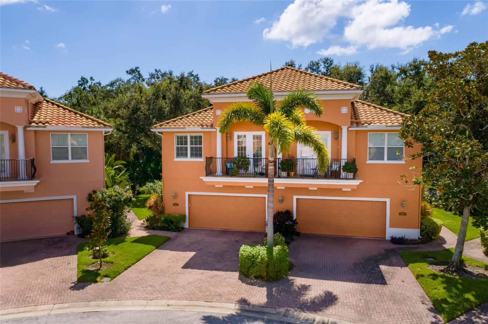Stop searching. This is the one buyers wait years for in Banyan Bay

Welcome to Banyan Bay, one of St. Petersburg's premier gated waterfront communities. Opportunities like this are incredibly rare. This exceptional end-unit townhome offers a combination of privacy, upgrades, and outdoor living that simply doesn't exist anywhere else in the community.

The backyard is what separates this home from everything else. Backing directly to the peaceful Little Banyan Bay Preserve, you'll enjoy a level of privacy and space that's almost impossible to find. Whether you're hosting unforgettable gatherings, celebrating life's biggest moments, or simply unwinding after a long day, this backyard delivers an experience—not just a place to live.

Step inside and you'll immediately appreciate the thoughtful design and quality throughout. Soaring ceilings, plantation shutters, and abundant natural light create a warm, inviting atmosphere. At the heart of the living space is a stunning custom-built entertainment wall featuring a sleek electric fireplace, handcrafted mantle, and shiplap accent wall—the perfect centerpiece that adds warmth, character, and a true custom-home feel.

The beautifully updated kitchen features quartz countertops, a walk-in pantry, and an open layout designed for everyday living and effortless entertaining. With three spacious bedrooms, two-and-a-half bathrooms, and a generous upstairs bonus living area, there's room for everyone to relax and enjoy.

The primary suite is its own private retreat, complete with a balcony overlooking the preserve—the perfect place to enjoy your morning coffee or end the day with a glass of wine surrounded by peaceful nature.

Additional upgrades include a brand-new air conditioning system, GE whole-house water filtration system, impact windows and doors, and an oversized two-car garage with exceptional storage.

Living in Banyan Bay means enjoying a truly low-maintenance, resort-style lifestyle. The HOA covers exterior maintenance, including the roof and building insurance, along with water, sewer, trash, cable, and internet. Residents also enjoy a heated pool, fishing pier, kayak storage, and beautifully maintained grounds.
If you've been waiting for the best opportunity in Banyan Bay, your search ends here.** Between the unmatched backyard, premium upgrades, custom finishes, end-unit privacy, and incredible community amenities, there simply isn't another home that offers this complete package.

Don't wait for another one to come along—because it won't.**
