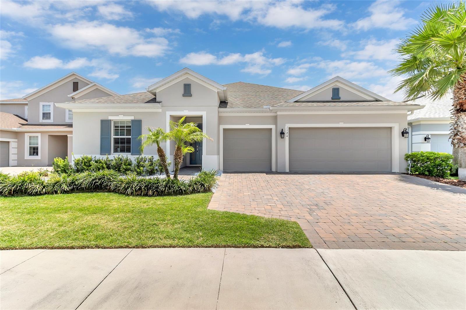 Welcome to 1124 Sadie Ridge Road, a beautifully appointed home nestled in one of Clermont's most desirable communities. This exceptional residence offers the perfect blend of elegance, comfort, and Florida living, featuring spacious interiors, modern finishes, and thoughtfully designed living spaces ideal for both everyday living and entertaining.

From the moment you arrive, you'll be captivated by the home's inviting curb appeal and picturesque setting. Inside, an open-concept floor plan creates a seamless flow between the living, dining, and kitchen areas, providing an abundance of natural light and a warm, welcoming atmosphere. The well-appointed kitchen serves as the heart of the home, offering ample cabinetry, generous counter space, and room to gather with family and friends.

The spacious primary suite provides a private retreat with a luxurious en-suite bath and ample closet space, while additional bedrooms offer flexibility for family, guests, or a home office. Step outside to enjoy Florida's year-round sunshine in your private outdoor living space, perfect for relaxing, dining al fresco, or entertaining. Hot tub included!

Ideally located in the rolling hills of Clermont, this home offers convenient access to shopping, dining, top-rated schools, parks, lakes, and major roadways while maintaining a peaceful residential setting. Whether you're looking for your forever home, a seasonal retreat, or an investment opportunity, this home delivers the lifestyle you've been dreaming of.