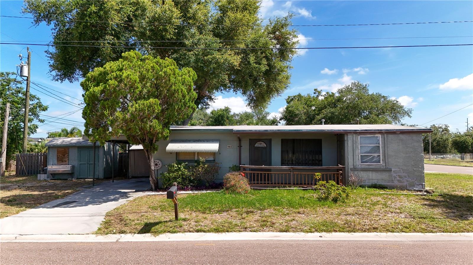 Positioned on a desirable corner lot in a convenient St. Petersburg location, this 2-bedroom, 1-bath single-family home with a 1-car carport offers a fantastic opportunity for homeowners, investors, or anyone looking to add their personal touch. Featuring a functional layout, the home includes an enclosed Florida room that provides additional living space, along with a separate laundry room for added convenience. While a few cosmetic updates could enhance its full potential, the property offers a solid foundation and is located in a non-flood zone for added peace of mind. Enjoy easy access to nearby attractions including Treasure Island Beach, St. Pete Beach, Walter Fuller Park, and the vibrant downtown St. Petersburg waterfront, along with abundant shopping, dining, entertainment, and recreational opportunities. Whether you're searching for your next home or a great investment opportunity, schedule your private showing today and discover the possibilities this property has to offer!