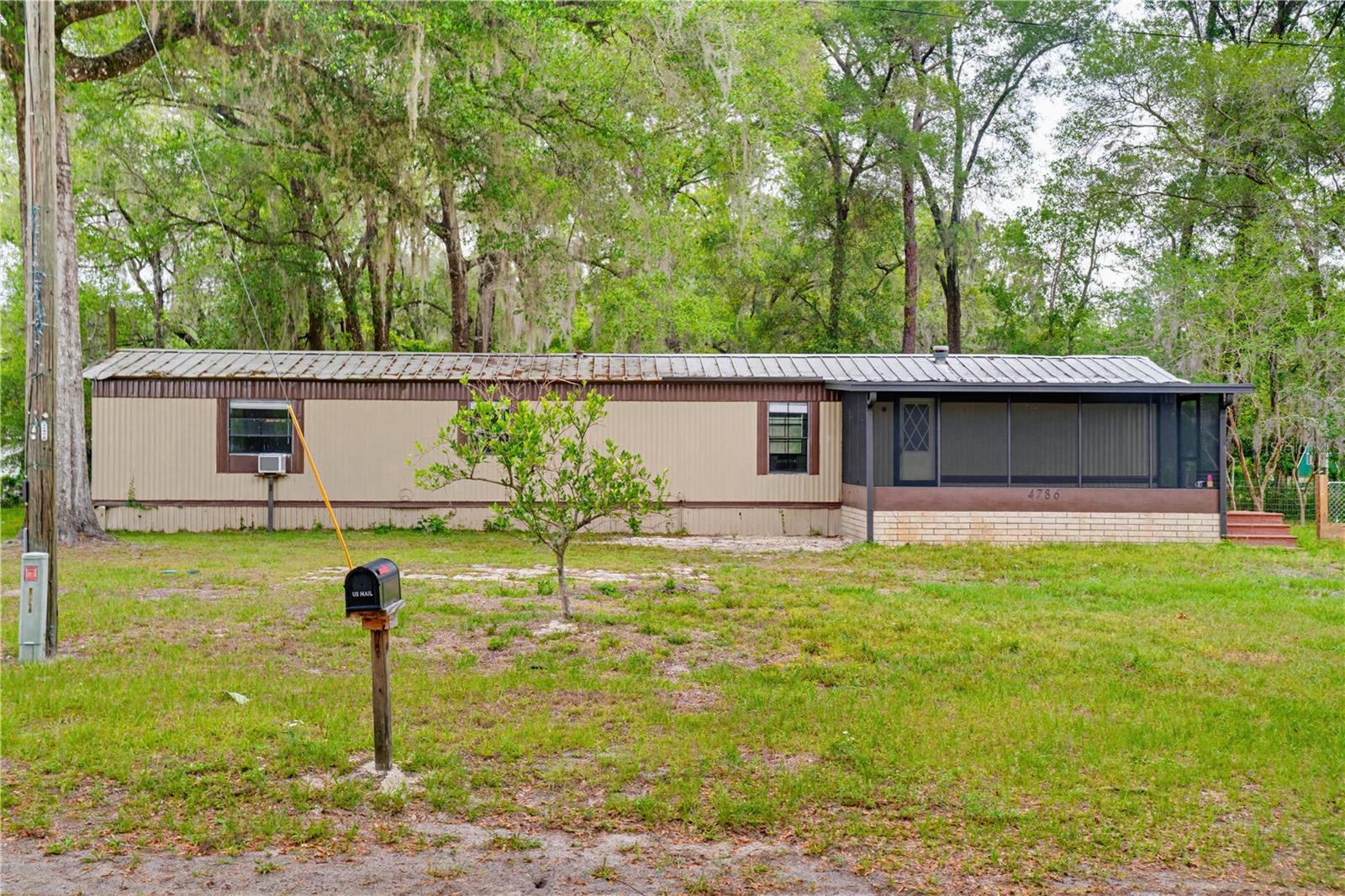 Escape the hustle without sacrificing convenience in this beautifully updated 2-bedroom, 1-bath home nestled on a quiet, shaded lot in a peaceful, low-density area. 
Whether you’re a first-time buyer, downsizer, or looking for a weekend getaway, this property delivers country charm with modern comforts.
Inside, you’ll find thoughtful updates throughout — including granite countertops, luxury vinyl flooring, fresh paint, a newer refrigerator, and updated AC units. Step outside to a newly ceramic-tiled porch perfect for morning coffee or evening relaxation, all within a fully fenced yard that’s ready for your four-legged family members.
With no HOA, you have the freedom to truly make it your own.
Ideally situated just off I-75, you’re only 20 minutes from Brooksville and Dade City, 30 minutes from Wesley Chapel and Ocala, and about an hour from Tampa — close enough to everything, far enough to breathe.
If you are looking for a turnkey rental, this one checks all the boxes. Rented easily in the past for $1265 a month, without all the recent improvements.