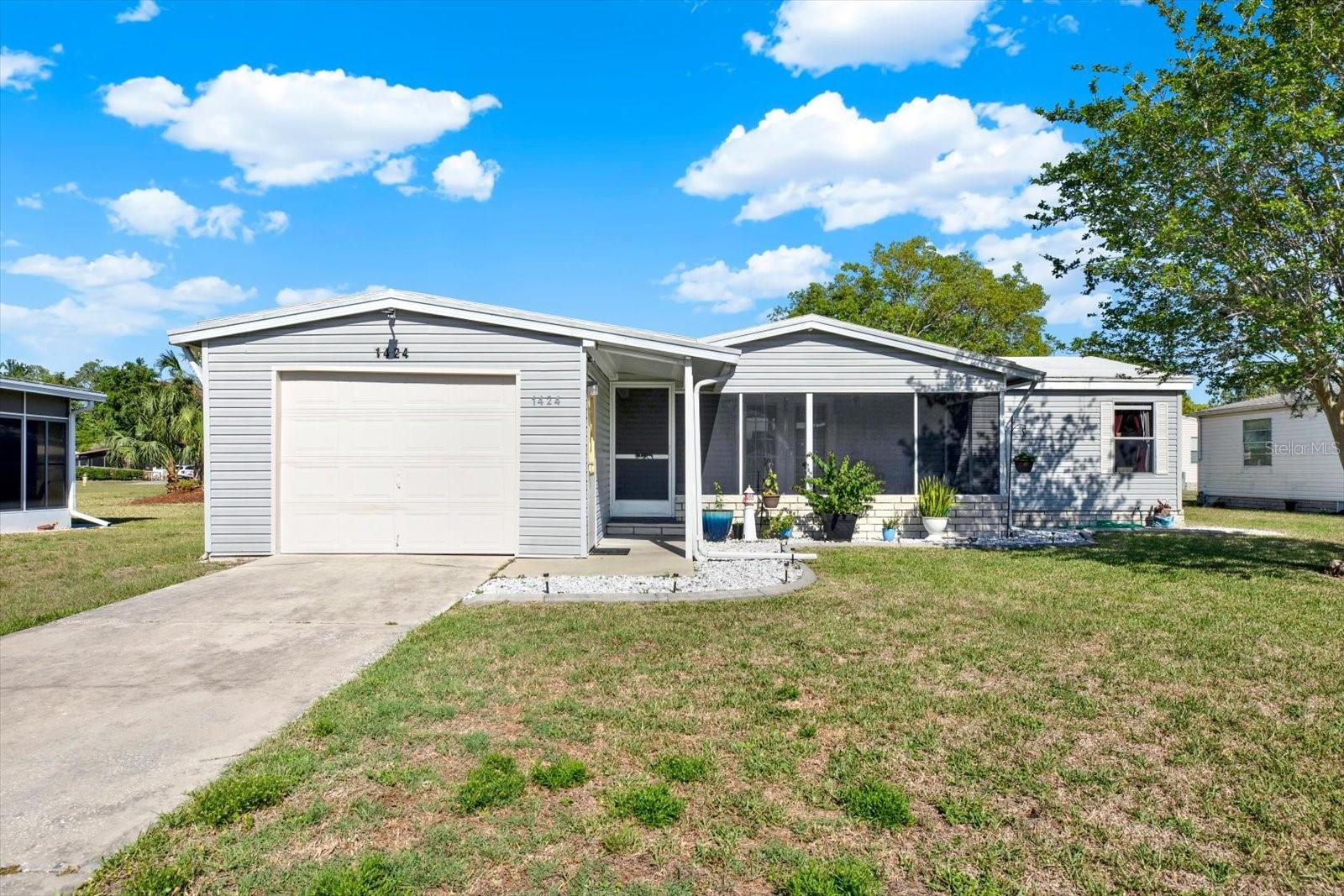 Welcome to the highly desirable community of Forest Glenn, where comfort, convenience, and Florida living come together beautifully. This well-maintained 3-bedroom, 2-bathroom home features an open floor plan with stylish laminate flooring throughout, creating a bright and inviting space perfect for both everyday living and entertaining. Enjoy your morning coffee or evening relaxation on the screened-in front porch, or unwind in the rear screened lanai overlooking your private outdoor space. Major updates include a newer A/C (2020) and roof (2015), offering peace of mind for years to come. Residents of Forest Glenn enjoy access to fantastic amenities, including a clubhouse, community pool, and shuffleboard courts--perfect for an active and social lifestyle. Conveniently located near shopping, dining, and local attractions, this home is an excellent opportunity to enjoy the best of Florida living.