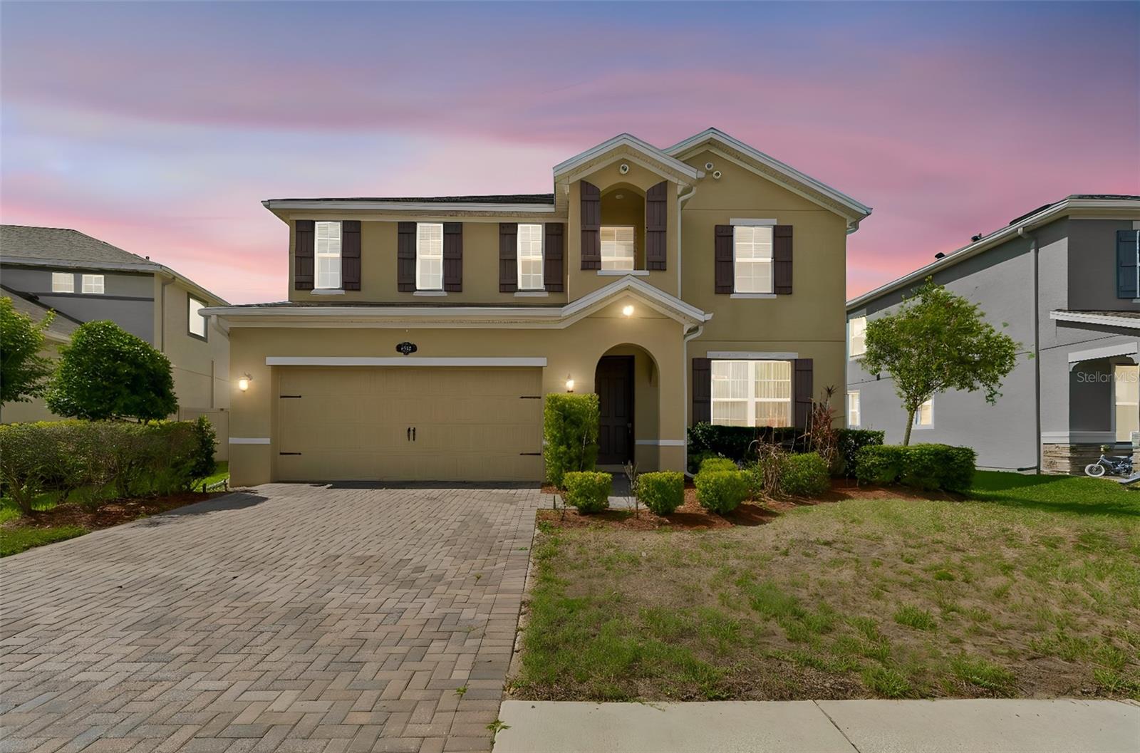 One or more photo(s) has been virtually staged. Welcome to 1192 Multiflora Loop in beautiful Lutz, Florida. A spacious and beautifully maintained home offering the perfect blend of comfort, style, and functionality. This stunning two-story property features an open-concept layout with generous living spaces, modern finishes, and abundant natural light throughout.

The heart of the home is the impressive gourmet kitchen, complete with granite countertops, stainless steel appliances, oversized cabinetry, a large center island with seating, and ample prep space; perfect for entertaining or everyday living. The kitchen flows seamlessly into the expansive living and dining areas, creating an inviting atmosphere for gatherings with family and friends.

Upstairs, you'll find spacious bedrooms, including a luxurious primary suite designed for relaxation with plenty of room to unwind. Additional flex spaces throughout the home provide endless possibilities for a home office, loft, media room, playroom, or guest accommodations.

Step outside to enjoy the oversized fenced backyard with plenty of room for entertaining, pets, family activities, or creating your dream outdoor oasis. The backyard offers privacy, open green space, and a patio area perfect for enjoying Florida evenings.

Located in the highly desirable Lutz area, this home is conveniently situated near shopping, dining, top-rated schools, parks, major highways, and everything near Tampa Bay area.

This move-in-ready home combines space, versatility, and modern Florida living. A must-see opportunity you don’t want to miss. 
Schedule your private showing today!