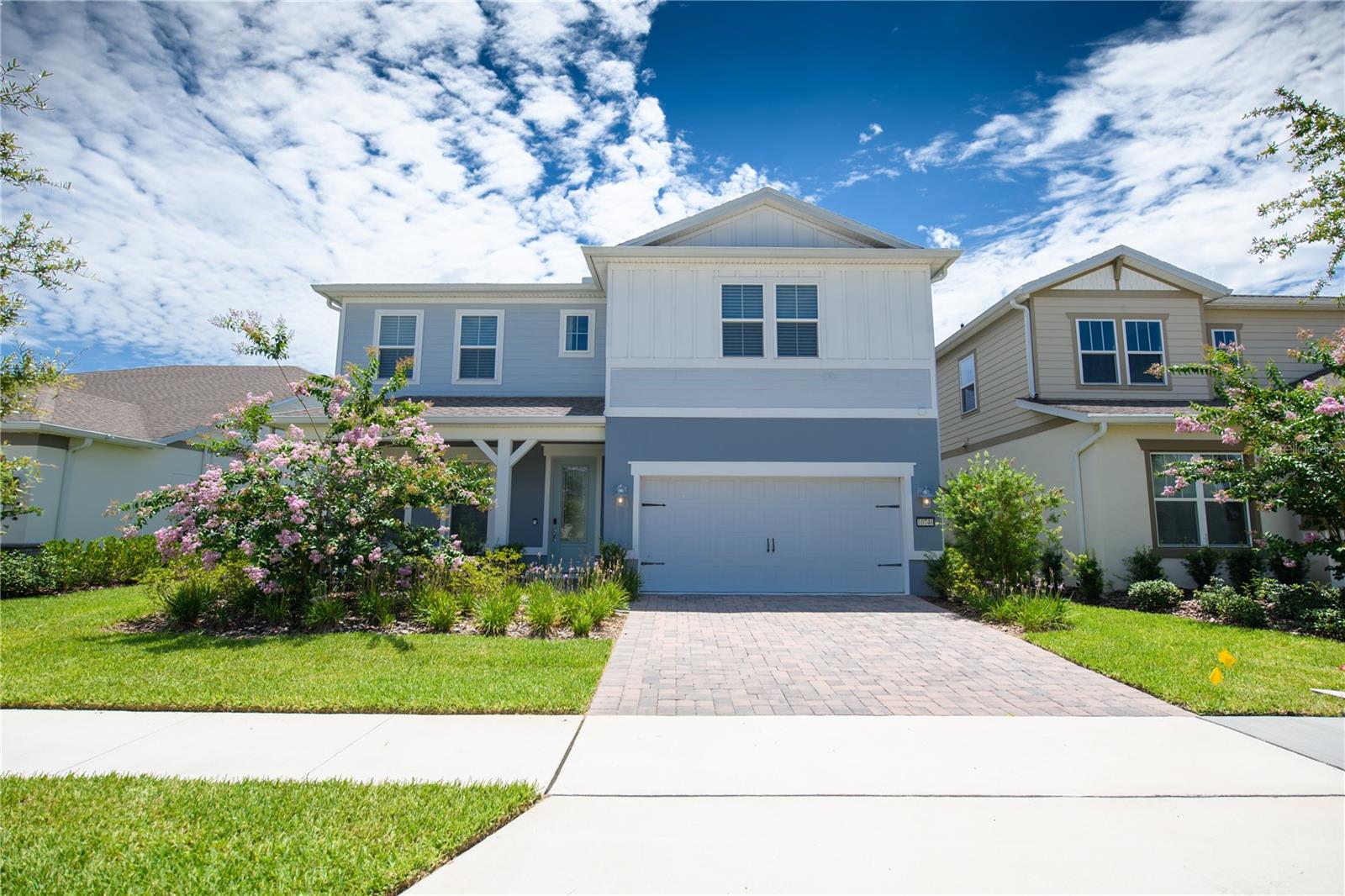 Welcome to this stunning 2024-built two-story residence located in the highly desirable Lake Nona area. Offering 4 bedrooms, 3 full bathrooms, 1 half bathroom, and nearly 2,900 square feet of living space, this thoughtfully designed home combines modern elegance with everyday functionality. The open-concept floor plan features a spacious gathering room, a versatile flex room, an upstairs loft, and a covered lanai, creating the perfect setting for both entertaining and comfortable living. The gourmet kitchen is a chef’s dream, showcasing a large center island, walk-in pantry, quartz countertops, stainless steel appliances, designer backsplash, and abundant cabinet space.

The first-floor owner’s suite provides a private retreat with a spa-inspired bathroom featuring dual vanities, a frameless glass shower, and a generous walk-in closet. Upstairs, you’ll find three additional bedrooms, two full bathrooms, and a spacious loft ideal for a media room, home office, or play area. Additional highlights include luxury finishes throughout, upgraded flooring, a dedicated laundry room, a 2-car garage with EV charging capability, and professionally selected designer features. Situated within a gated, resort-style community, residents enjoy access to exceptional amenities including a clubhouse, resort-style pool with splash area, fitness center, playgrounds, and basketball, tennis, and pickleball courts. Conveniently located near Lake Nona Town Center, Medical City, USTA National Campus, major highways, shopping, dining, and Orlando’s world-famous attractions.

Experience the perfect blend of luxury, convenience, and the vibrant Lake Nona lifestyle. Schedule your private showing today!