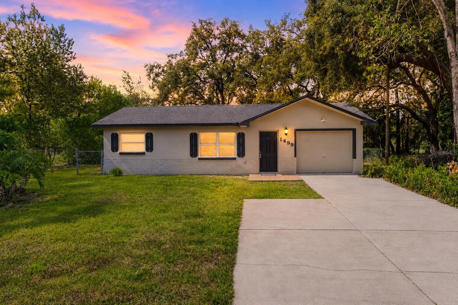 AFFORDABLE, MOVE-IN READY, NEW ROOF, OVERSIZED LOT, AND NO CARPET -- $190,000 IN SPRING HILL.

Clean. Fresh. Ready. And priced to move.

This 2 Bedroom, 1 Bathroom home with a 1 Car Garage sits on an Oversized Lot in Spring Hill with a Large Fenced Yard and a Storage Shed. 

No HOA. No CDD. No Flood Zone. And a New Roof to be installed before closing.

No carpet anywhere. Fresh paint throughout. Nothing to do but move in.

The Fenced Yard is genuinely big -- room for pets, a garden, a firepit, or just space to breathe. Hard to find at this price point.

$190,000. New roof. Oversized lot. Clean and ready. COME SEE IT!!