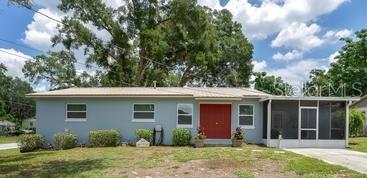 Welcome home to this charming 4-bedroom, 1.5-bath residence situated on a beautiful corner lot in a desirable area of Fruitland Park. This well-maintained home features a spacious fenced backyard, perfect for entertaining, pets, or family activities. The full bathroom offers a convenient Jack-and-Jill layout, providing direct access from the primary bedroom for added privacy and functionality. Enjoy Florida living year-round from the screened front porch and the large screened back porch. Inside, you'll find attractive laminate flooring throughout, a versatile bonus room, and a convenient indoor laundry room. The backyard also includes a storage shed equipped with air conditioning, offering excellent space for a workshop, hobby room, or additional storage. A durable metal roof and newer major components provide added peace of mind for years to come. Combining comfort, convenience, and a wonderful location, this lovely Fruitland Park home is ready for its next owners to move in and enjoy.