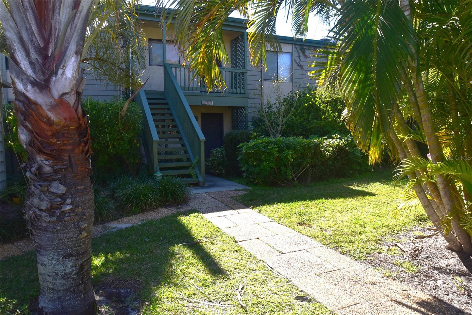 Pelican Cove is a waterfront community located in South Sarasota.  Your new condo is a first floor 2 bedroom 2 bathrooms, with a million dollar view.  This is the perfect condominium to make it yours... design it the way you want. Priced right to sell!  This will go quickly! Pelican Cove is a 75-acre, gated, vibrant-waterfront community nestled among manicured tropical foliage. Truly offering something for everyone. Abundant amenities include the 86-slip boat harbor with excellent rates & a launch dock for kayaks and canoes, 6 heated swimming pools, hot-tub, 3 clubhouses, lighted tennis/pickleball courts, basketball, dog walk area, walking trails and boardwalks, as well as fishing gazebos, water exercise classes, exercise facility, 2 art studios and a pottery classroom. Take classes at Pelican Cove University or join one of the more than 37 clubs/groups for photography, fiber art, bike riding, culinary arts and card clubs. Woodworking, sculpting, and evening jazz & classical music concerts round out the active lifestyle. Come and see what you have been waiting for.