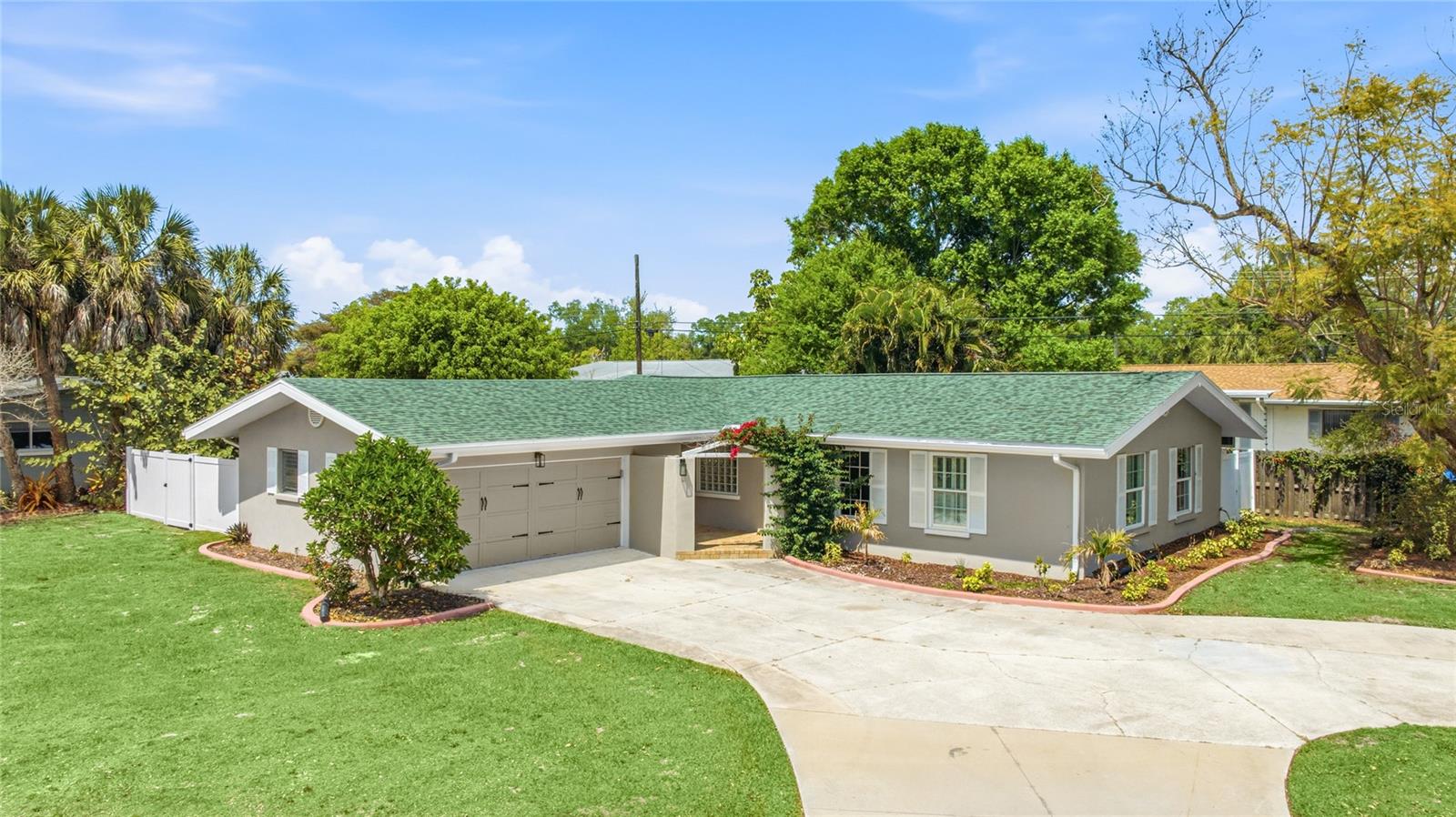 Back on the market fresh, improved, and truly move-in ready, this fully renovated 3-bedroom, 2-bath home now features even more valuable upgrades for added peace of mind. Recent major improvements include a brand-new electrical panel, professionally repaired HVAC ductwork, a brand-new tankless water heating system for the interior of the home, a serviced garage door with a newly installed reverse safety system and garage door opener, plus a sewer system inspection and professional cleaning completed by a licensed plumber with a transferable 10-year warranty provided. Combined with a newer roof and updated HVAC system, this home offers the perfect blend of style, comfort, and confidence in the heart of Central Sarasota. Ideally located just minutes from Downtown Sarasota, Siesta Key Beach, shopping, dining, and all that Sarasota has to offer, the location makes it easy to enjoy the very best of the area. Inside, a bright and open layout immediately stands out, featuring expansive living spaces, wide plank flooring, and an abundance of natural light pouring through oversized windows. The seamless flow between the living, dining, and kitchen areas creates an inviting atmosphere that feels both airy and connected. The fully redesigned kitchen showcases sleek cabinetry, stainless steel appliances, modern lighting, and a large peninsula with bar seating, perfect for entertaining or casual everyday living. Both bathrooms have been tastefully renovated with contemporary finishes, stylish tile work, and glass enclosures, continuing the home’s clean and cohesive modern aesthetic. Extensive updates throughout include new flooring, fresh interior and exterior paint, updated landscaping, modern lighting, and updated doors. All three bedrooms offer comfortable space and natural light, while the overall design feels fresh, bright, and completely turnkey. Step outside to the backyard with a spacious patio ideal for relaxing, entertaining, or creating your own outdoor retreat. With plenty of room for pets, play, or future possibilities, and no HOA restrictions, this property delivers flexibility along with style. Freshly reintroduced to the market and loaded with upgrades, this is an exceptional opportunity to own a beautifully renovated Sarasota home that is ready to enjoy from day one. **THIS PROPERTY QUALIFIES FOR A 1% LENDER INCENTIVE IF USING PREFERRED LENDER. INQUIRE FOR MORE DETAILS.**