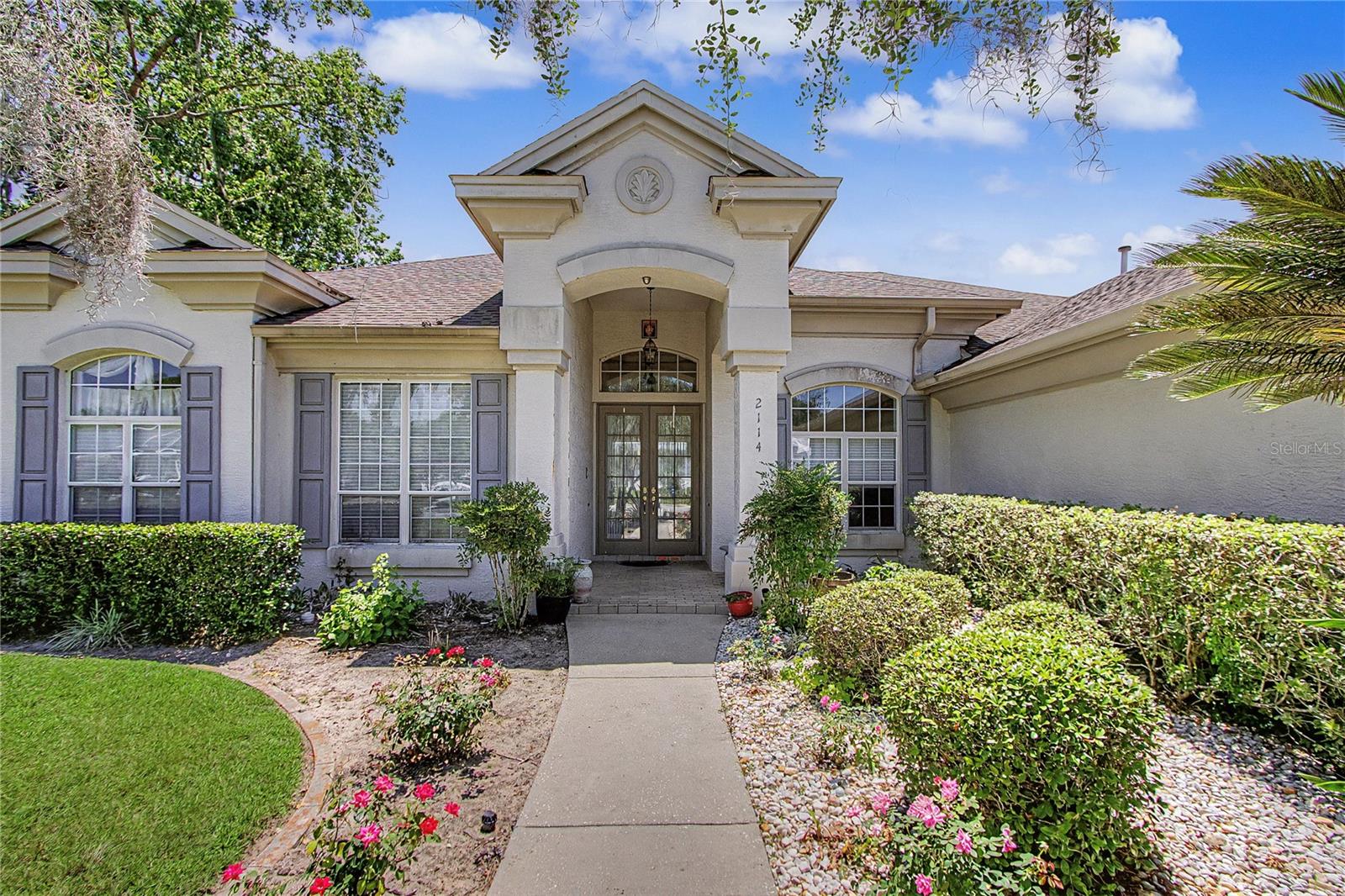 Beautiful custom 4-bedroom, 3-bath pool home located in the gated community of Laurel Wood. Family room features a stacked stone gas fireplace with built-ins, while separate living areas open to the pool and patio through French doors. Kitchen includes granite countertops, gas range, ample cabinetry, and workspace area.

High ceilings and wood flooring throughout the home. Spacious primary suite offers a large walk-in closet, dual vanities, and spa-style bath. One bedroom/office includes a built-in wall bed for flexible use.

Outdoor area includes a summer kitchen, pool, updated paver deck, fenced yard, and playground area. Interior and pool have both been recently updated.