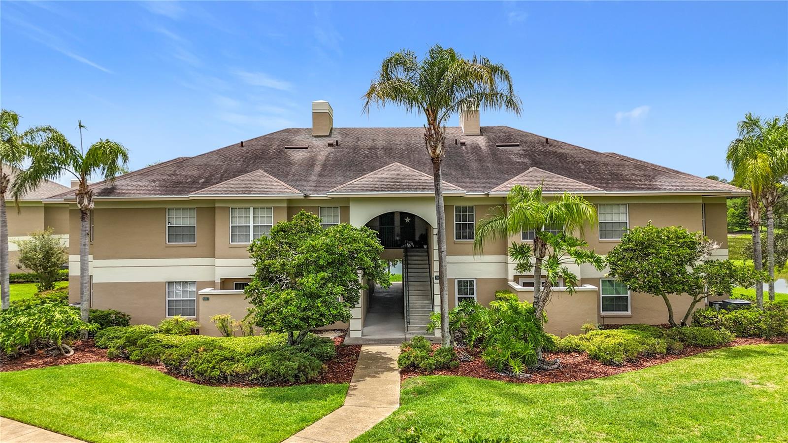 Don't miss this rare opportunity to own this lovely GROUND FLOOR Eagle Pond condominium in the highly sought-after gated community of Cypresswood Golf and Country Club that is PRICED TO SELL! Be greeted by 10-foot high ceilings, complimenting the open concept living area complete with expansive living and dining areas complete with a kitchen breakfast bar. All NEW luxury vinyl flooring, NEW windows and sliding glass patio door, NEW kitchen countertops, and fresh interior paint offer efficiency, comfort, and modern elegance. Walk-in closets in both bedrooms offer an abundance of space for organizing your belongings, and an en suite bathroom in the main bedroom for privacy and convenience with a serene pond view from the primary bedroom. Enjoy the open-concept living area for entertaining friends and family and a private patio further compliment this delightful property. Immerse yourself in the outdoors on your private gated patio or take a walk, run, or bike ride to enjoy the natural scenery that abounds in this community. Cypresswood Golf and Country Club features a 24-hour manned guard gate, 18-hole championship golf course designed by Ron Garl, junior Olympic-sized community pool, lighted tennis/pickleball/basketball courts, clubhouse, restaurant, pro-shop, event space, and so much more. The low monthly HOA fee includes all exterior and grounds maintenance, pest control, trash collection, and use of the pool and tennis amenities. Residents also enjoy a discount on daily golf and annual membership! Minutes from Highway 27 and the I-4 corridor, Winter Haven's very own Legoland Florida Resort, the Polk Parkway, and in the center of a thriving community with many convenient grocery, restaurant, shopping, and commuting options. Schedule your private showing today!