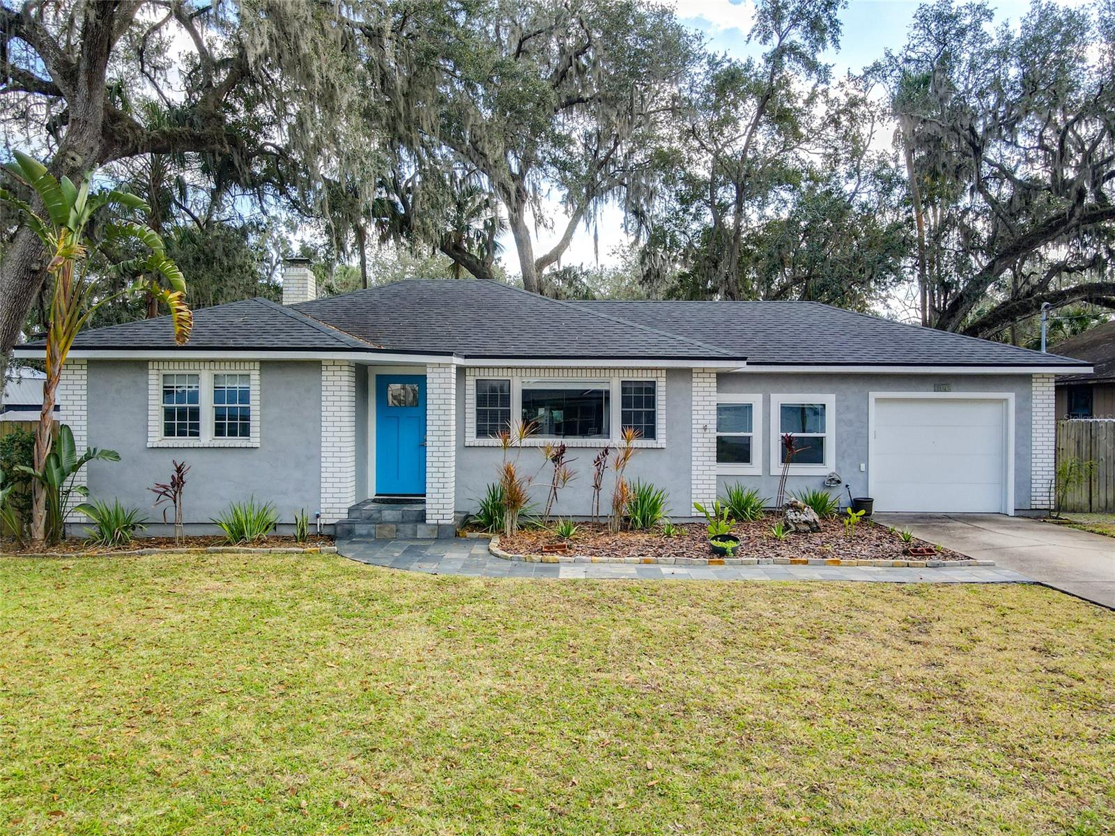 Turn key perfection in this totally renovated historic home located on a quiet, tree lined, cul-de-sac in a very desirable Faulkner Street neighborhood just steps from the river. Open floor plan with gorgeous refinished original hard wood floors, completely updated chefs kitchen with all top of the line appliances (2021 Samsung French door fridge, GE Monogram natural gas range, Bosch dishwasher, LG washer/dryer).) All hardwood cabinetry, farm sink, center island, butcher block counter tops. This home has been renovated with historic flare, tile design and hardware to capture its historic beauty. Large master and guest room with crown molding, completely updated spacious full bath and half bath with barn door off living area, additional completely enclosed private outdoor shower. A fully finished air-conditioned sunroom with French doors that can be additional dining, office or bedroom space has had a/c added for additional living space. Enjoy evenings under the lush oak trees at the fire pit in the very large fully fenced back yard with large covered patio area and additional storage area for boat. No HOA restrictions. Perfect NSB location to join the neighbors on a golf cart ride or short walk to Canal street restaurants/shops and close to north causeway for beach access or Flagler ave. Azalea Circle is a high and dry street and had no flooding issues during last years storms. New roof 2016, new plumbing 2019, new complete 11k HVAC top of the line system (April 2022), 3 zone irrigation system,  newer windows, and newer hurricane rated garage door. ;Water: City