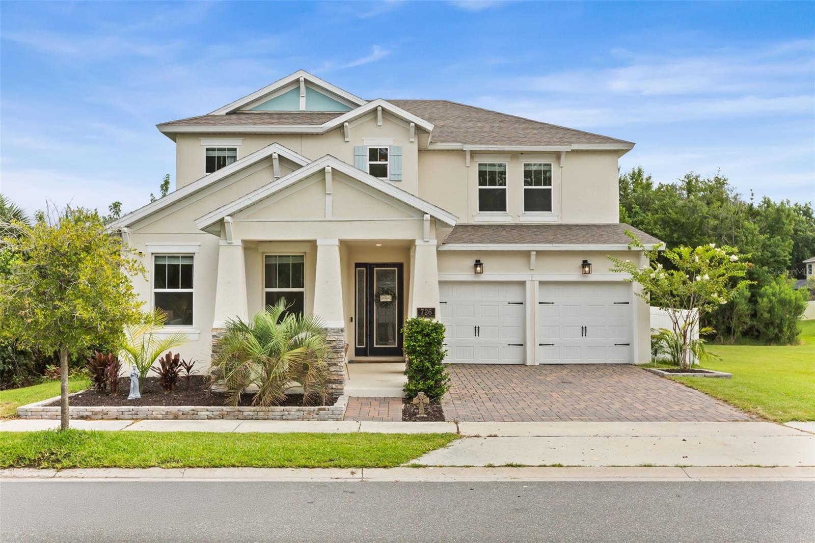 Don’t wait for new construction, this turnkey 2022-built home offers the look and feel of a brand-new build with valuable upgrades already completed. Located in the highly sought-after Rivington community, this two-story home features 4 bedrooms, 3.5 bathrooms, approximately 2,924 sq ft of living space, and a two-car garage. Situated on a rare oversized homesite with no neighbors on either side or behind, the property provides exceptional privacy and an open, peaceful setting that is difficult to find within the community. Inside, the thoughtfully designed open floor plan features high ceilings, abundant natural light, and spacious living areas ideal for both everyday living and entertaining. The kitchen serves as the heart of the home, offering quartz countertops, stainless steel appliances, generous cabinetry, and a large island overlooking the main living space. Additional upgrades include a whole-home water filtration system. A flexible first-floor room provides the perfect setting for a home office, formal dining area, or additional sitting room. The primary suite is conveniently located on the main level and features a spacious bedroom, private en-suite bathroom, and walk-in closet. Upstairs, three additional bedrooms, two full bathrooms, and a versatile bonus room provide plenty of space for guests, a playroom, home office, or media area. Step outside to enjoy Florida living from the screened-in rear patio and extended paver deck, creating an ideal space for relaxing, grilling, and entertaining. The oversized backyard is further enhanced by vinyl fencing, conservation views, and the privacy of having no adjoining homes on either side or behind the property. Ideally located near the DeBary SunRail station, parks, shopping, dining, and the continued growth of downtown DeBary, this move-in-ready home offers the perfect combination of privacy, space, and convenience. Schedule your private showing today!
