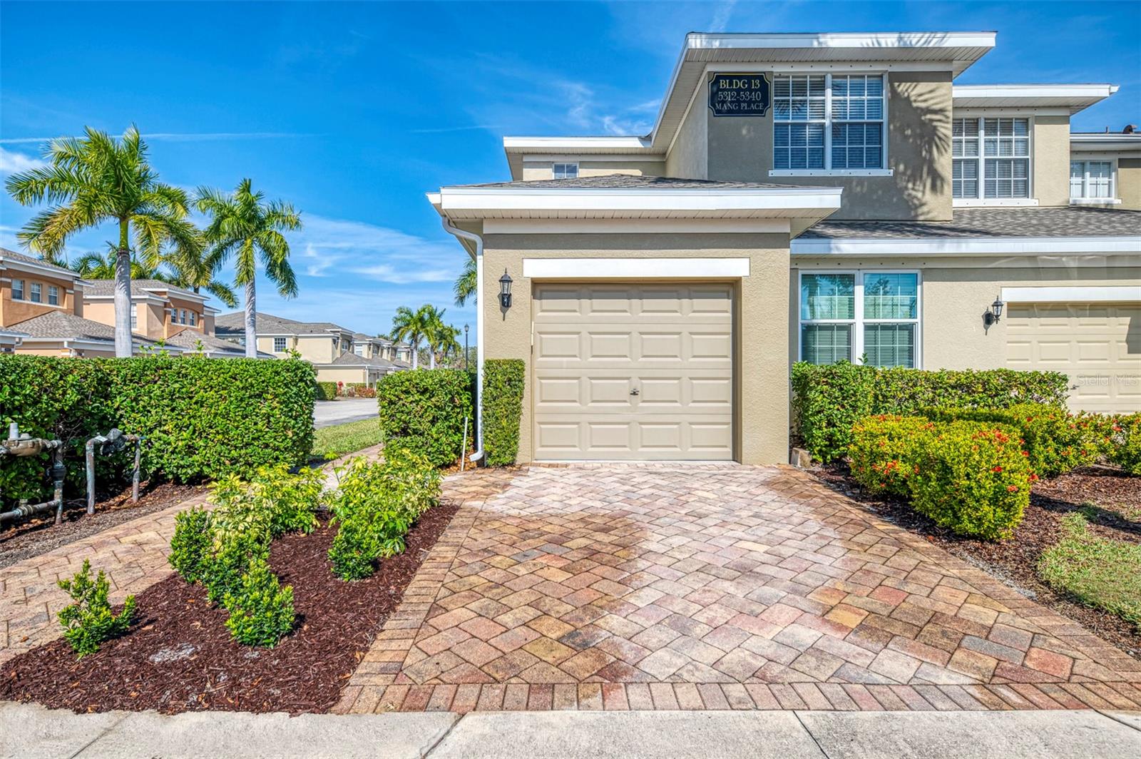 There's something to be said for living above it all. This second-floor end-unit in the gated community of Palmer Oaks delivers exactly that — a private, elevated retreat with soaring vaulted ceilings, pond views from your balcony, and the kind of open, light-filled layout that makes every day feel a little more like vacation. Brand-new roof (2024) and freshly painted exterior (2024) mean the biggest-ticket items are already done. Move in, unpack, and start living.
Inside, the great room opens wide with elegant tile flooring, ceiling fans, and natural light pouring through every window. The kitchen is built for people who actually cook — granite counters, a center island with breakfast bar, 42-inch wood cabinetry, stainless steel appliances, and a generous pantry. The primary suite has the walk-in closet and designer fixtures it deserves, and two additional bedrooms plus a versatile den give you the flexibility for a home office, guest room, or media space. Hurricane shutters and an attached one-car garage round out the practical side of things.
Outside your front door, the community pool is steps away. And the location? It's genuinely hard to beat for day-to-day convenience — Publix, Chick-fil-A, banking, and retail at Pelican Plaza and The Shoppes at Palmer Ranch are all within minutes. The Legacy Trail runs nearby for walking and biking. Siesta Key Beach — ranked the #1 beach in the nation — is under 20 minutes. I-75 and Sarasota-Bradenton International Airport are a quick drive for easy travel.
This is low-maintenance, move-in-ready Florida living with the upgrades already handled and the lifestyle already built in. Schedule your private showing today.