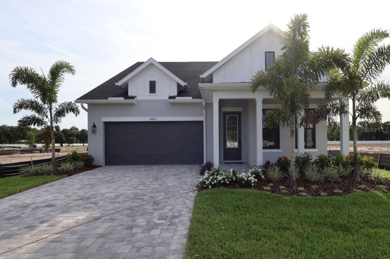 Under Construction. You’ll be delighted by the attention to detail and expert design of The Hemphill, 2-story  floor plan by David Weekley Homes in the brand new, suburban lifestyle community of Lakeview Crossing in Sarasota. Open-concept family and dining spaces showcase our LifeDesign? refinements that grant this floor plan exceptional style and livability. This home offers 3 bedrooms, 2 full baths, 1 half bath, a study, upstairs retreat and a 3-car tandem garage. Prepare, present and enjoy your culinary masterpieces on the designer kitchen center island overlooking the open gathering spaces. Pamper yourself in the spa-inspired Owner’s Bath and explore the wardrobe potential of the large walk-in closet before retiring to the lovely first floor Owner’s Retreat. Also on the first level, you'll find the office with french doors as well as a convenient powder room and indoor laundry.  Make your way upstairs to privacy and personality, making each extra bedroom and the retreat a great place to thrive.  In the fully gated community of Lakeview Crossing, you are conveniently located close to downtown Sarasota (10 miles), UTC shopping center (9.4 miles), Siesta Key Beach (12 miles) & SQR airport (15 miles).  Come see what quality construction and thoughtful design looks like for yourself and make this David Weekly Home yours today. **This property offers a limited-time interest rate incentive.