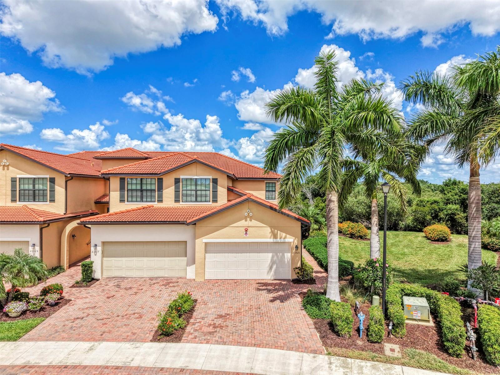 Welcome to a "Golfer's Paradise" in the highly sought-after gated resort community of Sarasota National. This beautifully appointed three-bedroom, two-bath coach home is elegantly "Turnkey Furnished" and perfectly positioned to capture a stunning preserve, water and golf course views. Designed for effortless Florida living. This spacious residence offers comfort, style and an exceptional resort lifestyle all in one. Step through the elegant, beveled glass entry door into a beautifully designed home where timeless architecture meets modern comfort. An inviting dining room with graceful arched details sets the tone, flowing seamlessly into a spacious living room ideal for everyday living and entertaining. The thoughtfully designed kitchen is the heart of the home, featuring quartz countertops, subway tile backsplash and stainless steel appliances. The desirable split-bedroom offers added privacy and flexibility, making it perfect for hosting guests or creating a comfortable retreat for everyone in the household. Relax on your private lanai while enjoying peaceful panoramic scenery and breathtaking sunsets. Residents of Sarasota National enjoy world-class amenities including: Three restaurants and fine dining, Coffee shop with Wi-Fi, Resort style heated pool and spa, Complete fitness center with two dedicated exercise and yoga studios, Pickleball and tennis courts, Bocce ball courts, Two dog parks and children's playground, Pro shop, plus two golf memberships are included for the championship golf course designed by Gordon B. Lewis. Whether you are seeking a seasonal retreat, full-time residence, or investment opportunity, this exceptional home offers luxury resort living at its finest. Experience the ultimate Florida golf and lifestyle community--where every day feels like a vacation.